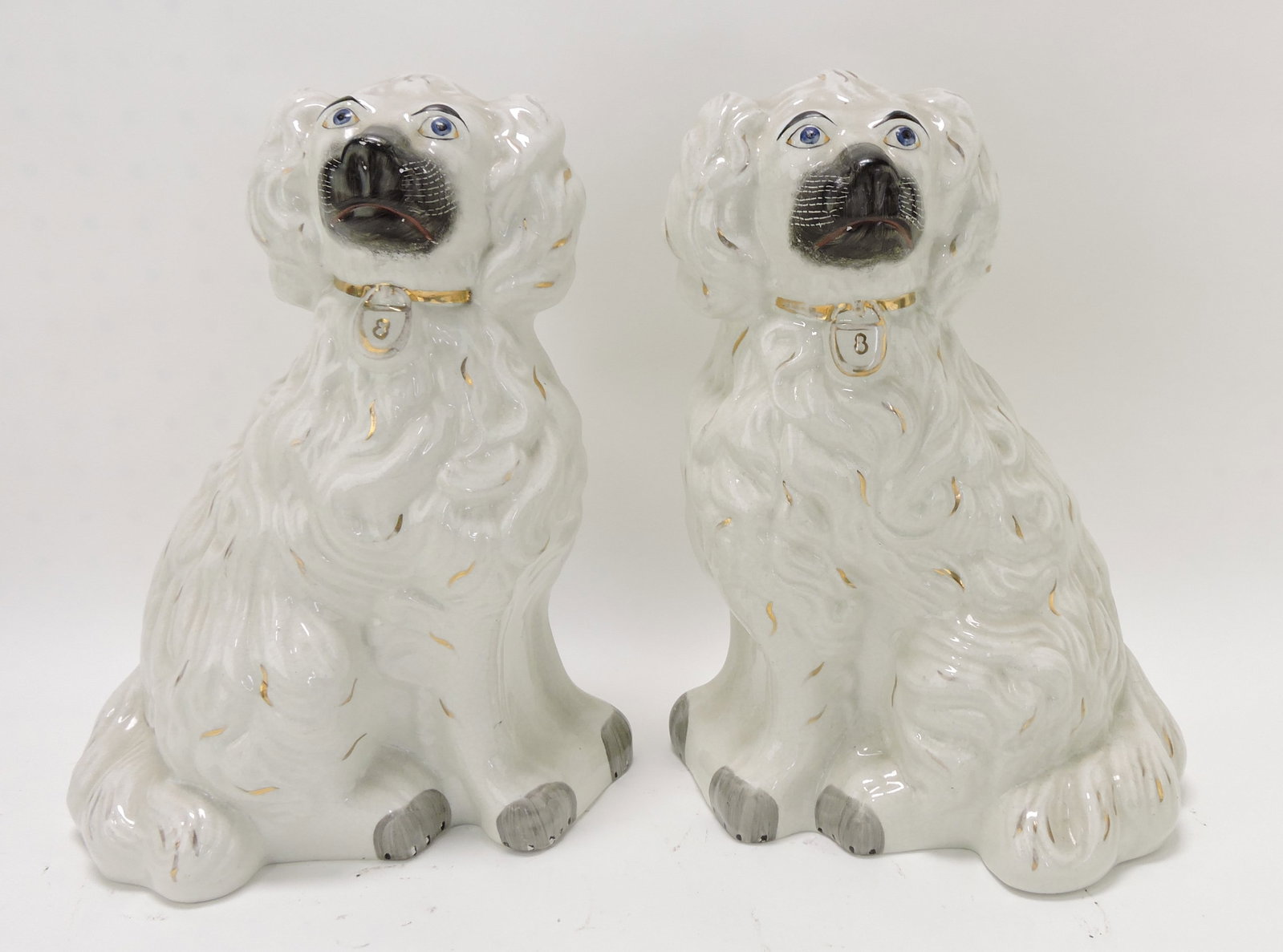 Staffordshire pair of Maltese dogs, 12": .