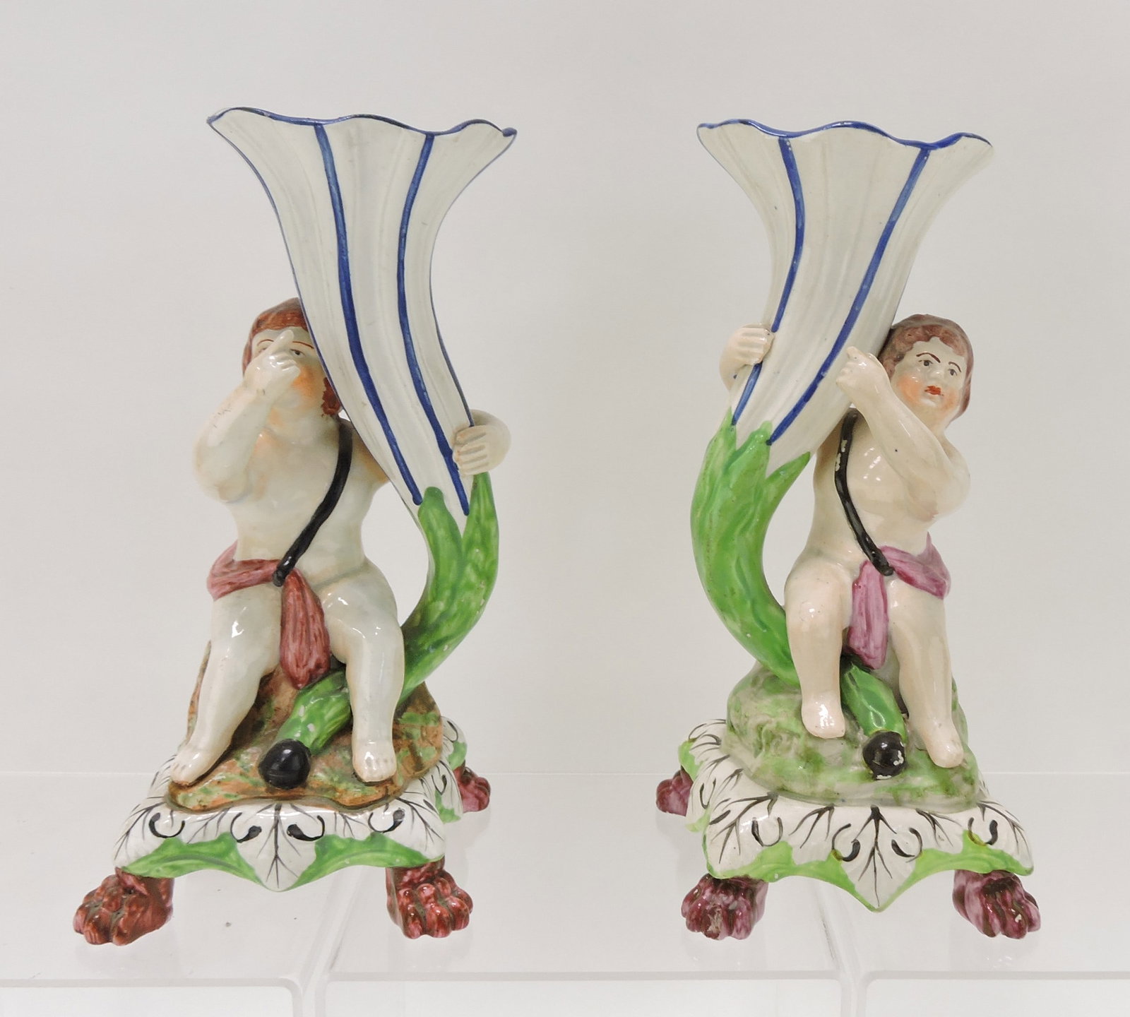 Staffordshire Pearlware pair of putto: with cornucopia vases, 9 1/2"