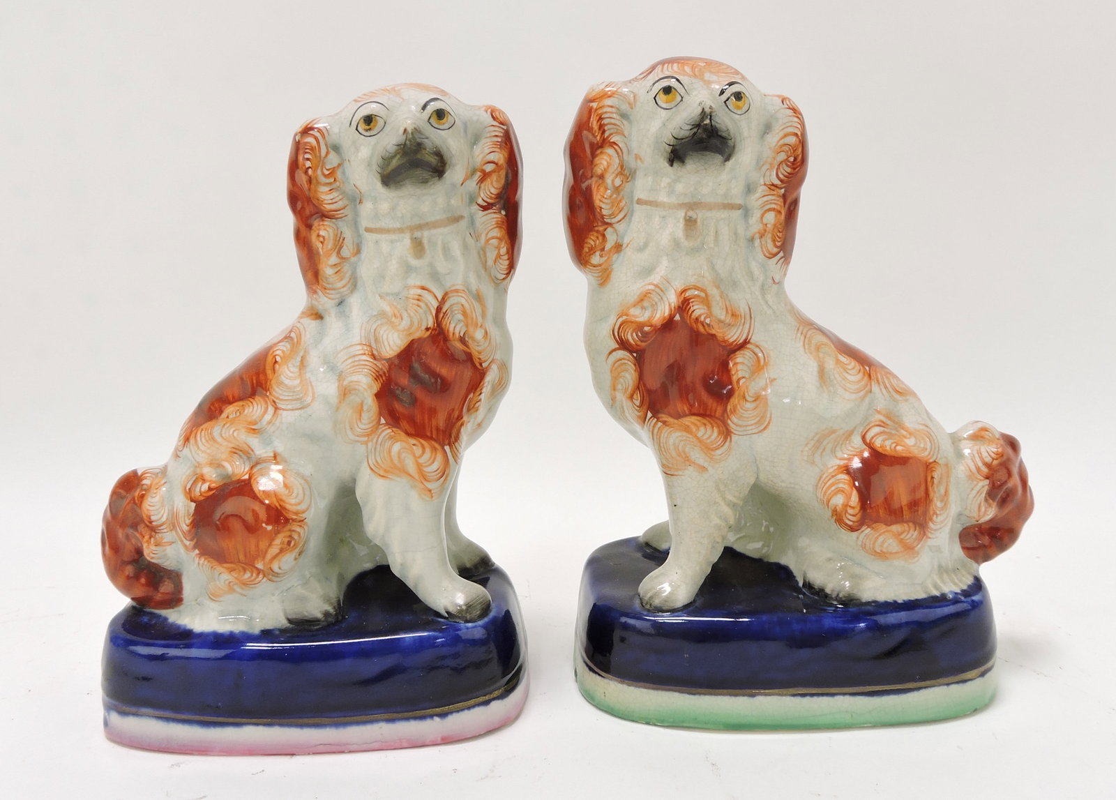 Staffordshire pair of russet spaniels: on cobalt bases, 8"