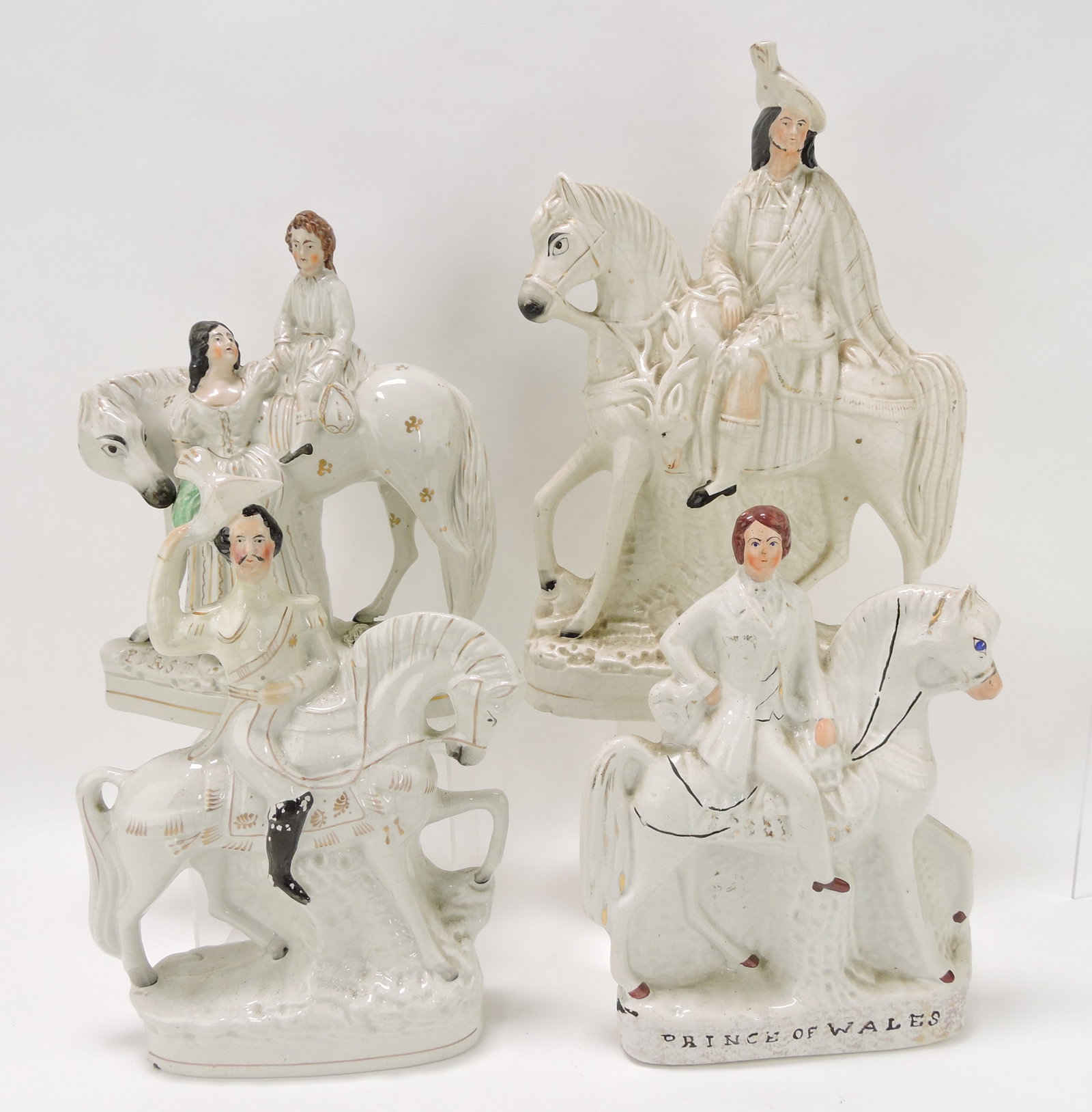 Staffordshire lot of 4 equestrian: figures, 11 to 15", various condition