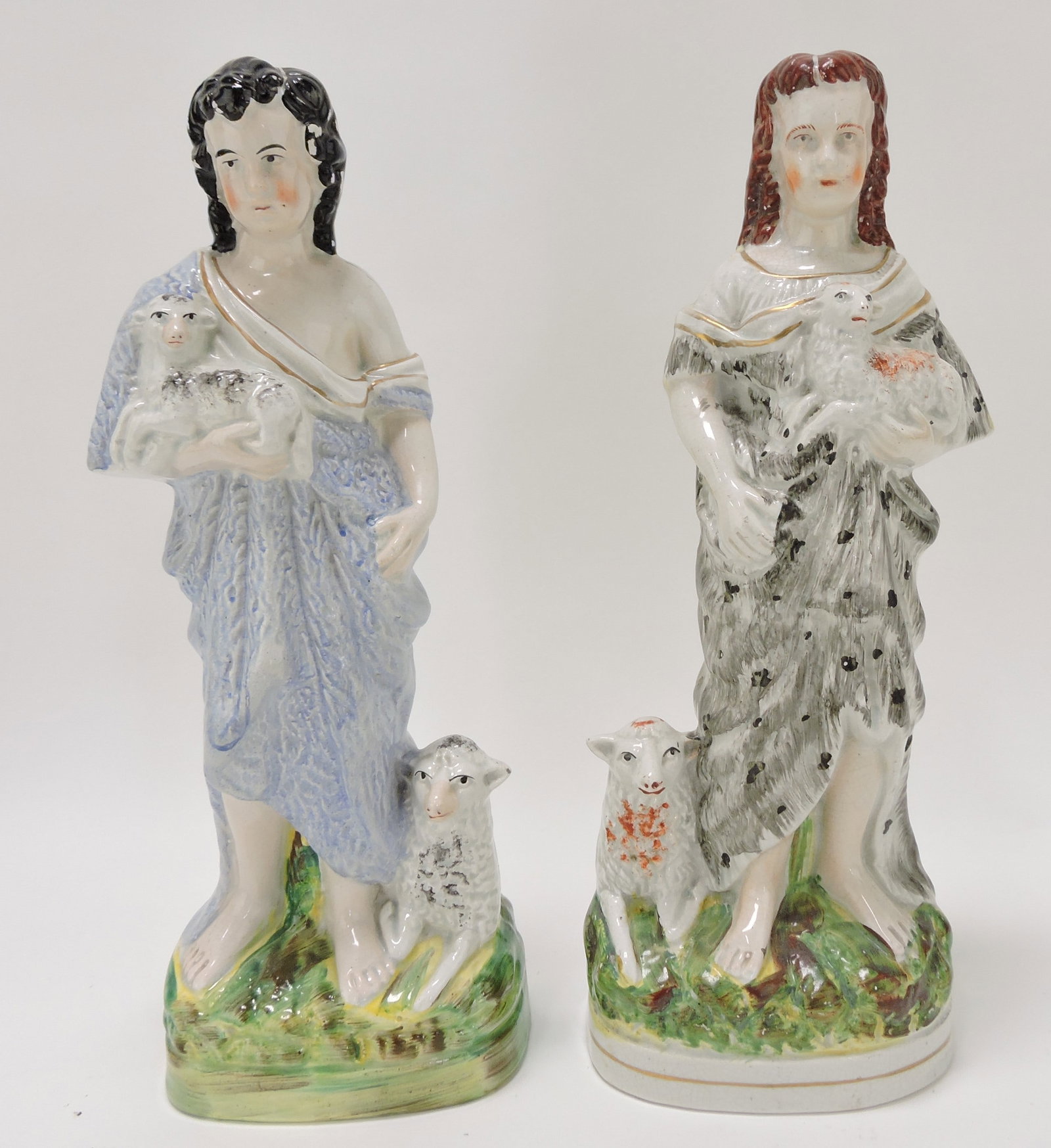 Staffordshire pair of figures of girls: with sheep, firing line to left figure, 12"