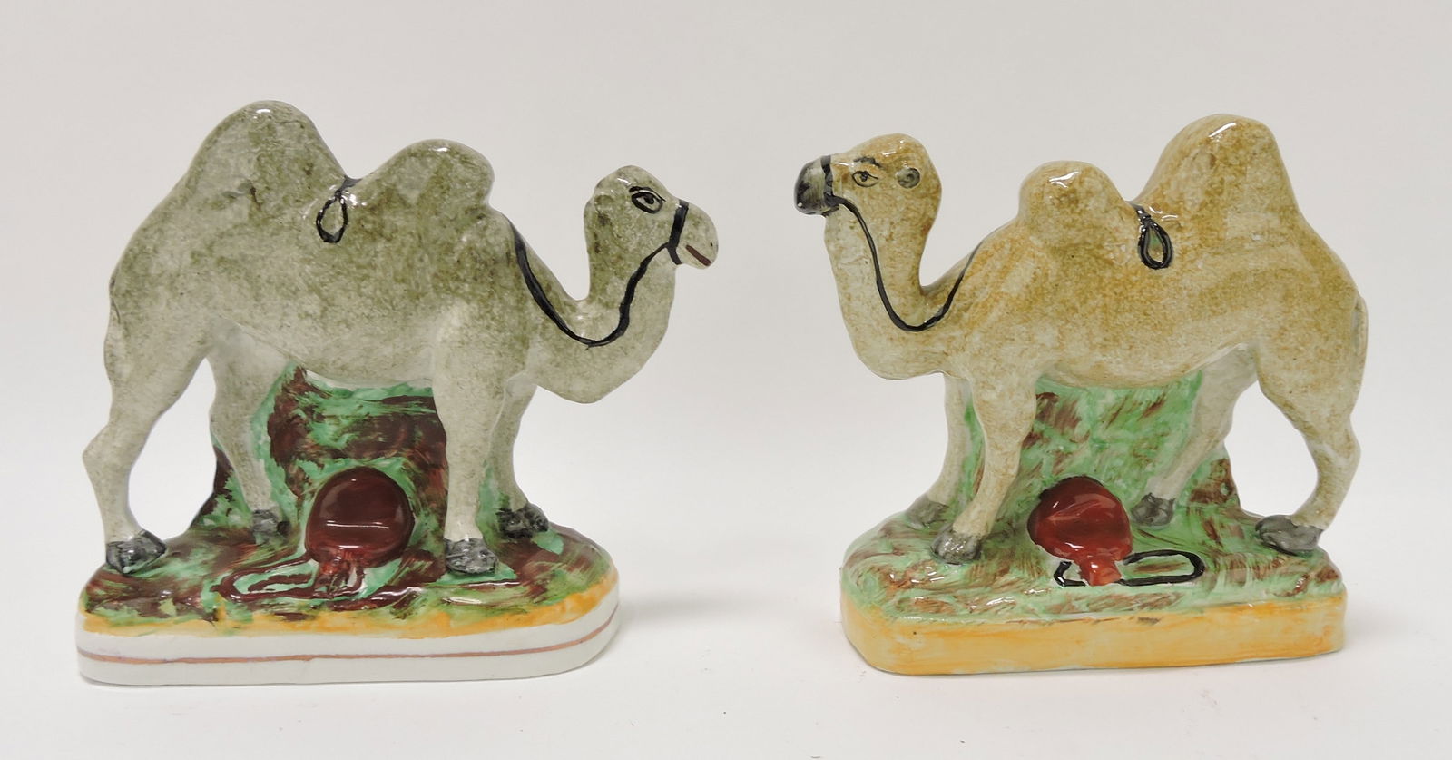 Staffordshire lot of 2 camel figures, (1 of 1)