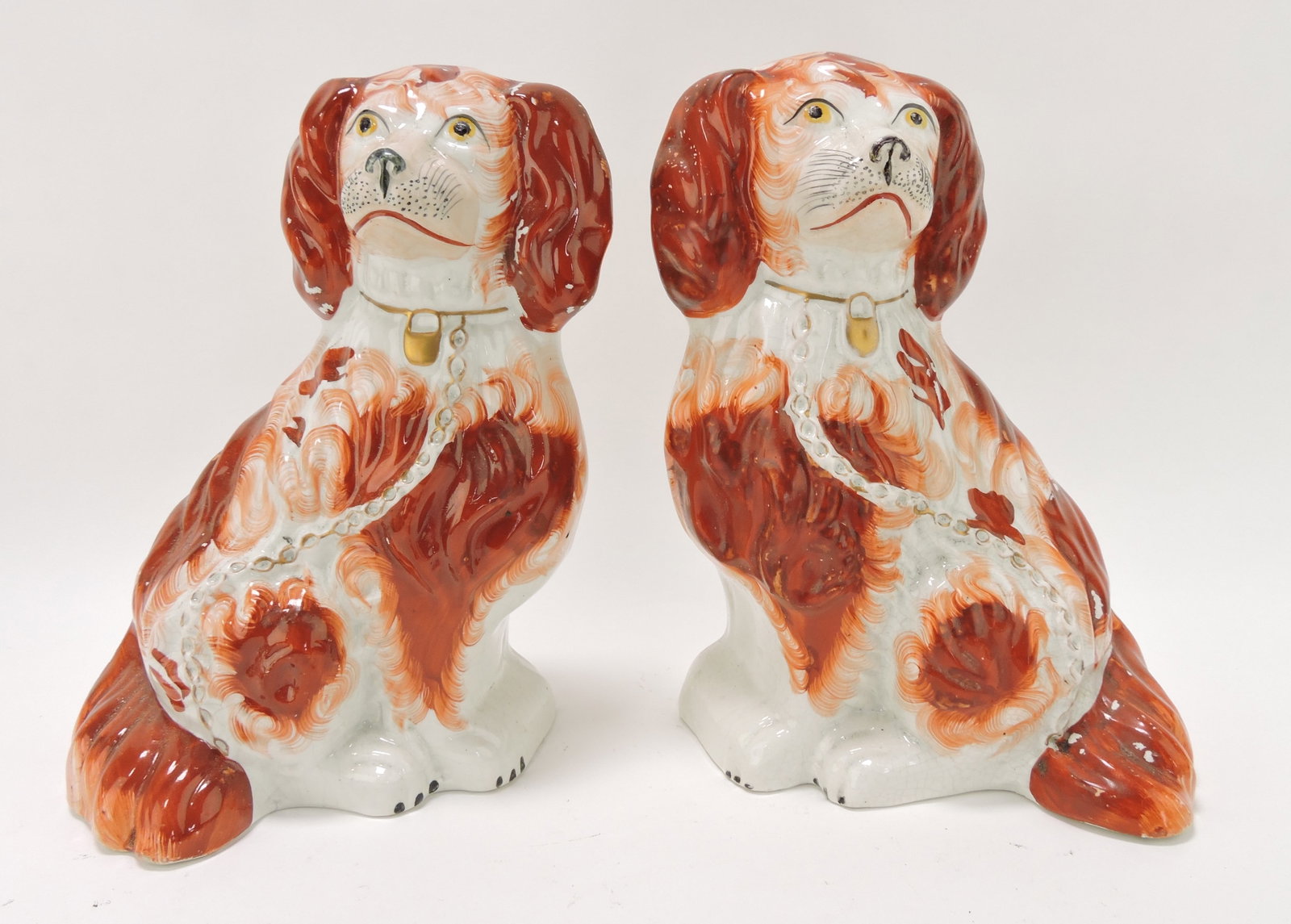 Staffordshire pair of russet spaniels,: 10"