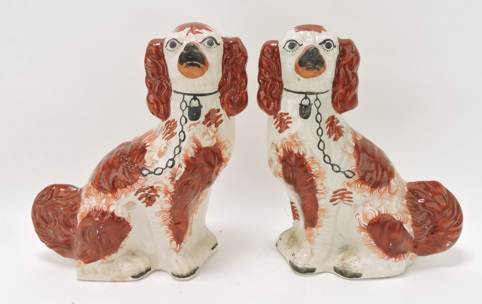 Staffordshire pair of russet spaniels,: 12"