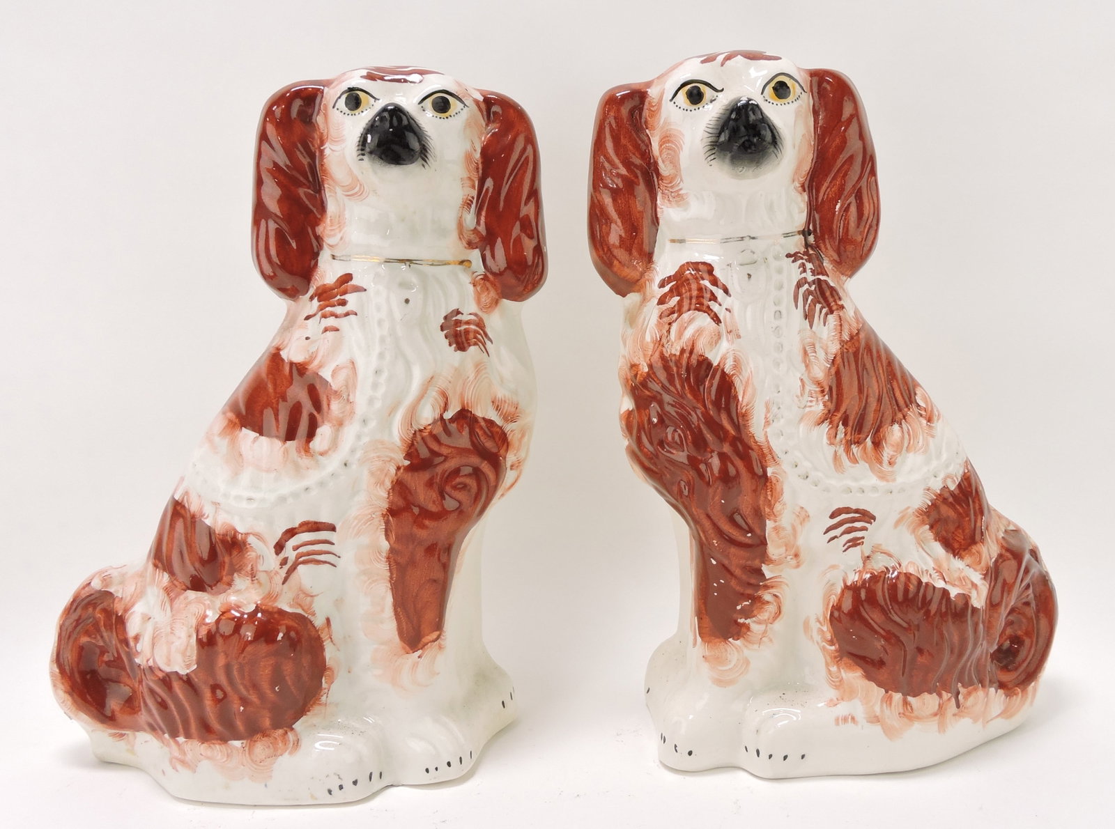 Staffordshire pair of large russet: spaniels, 15"