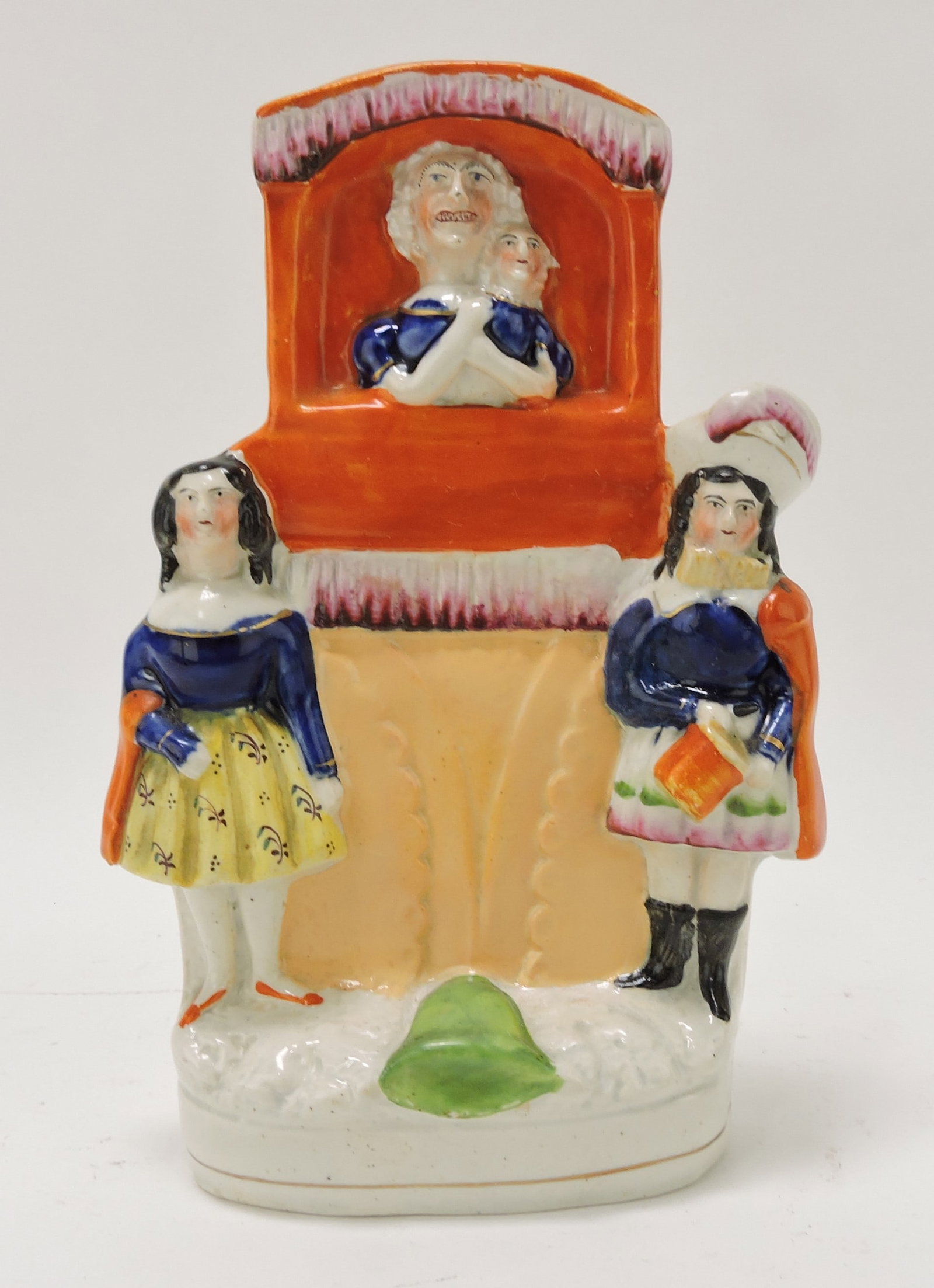 Staffordshire figure of Mrs. Punch: puppet theatre, 9"