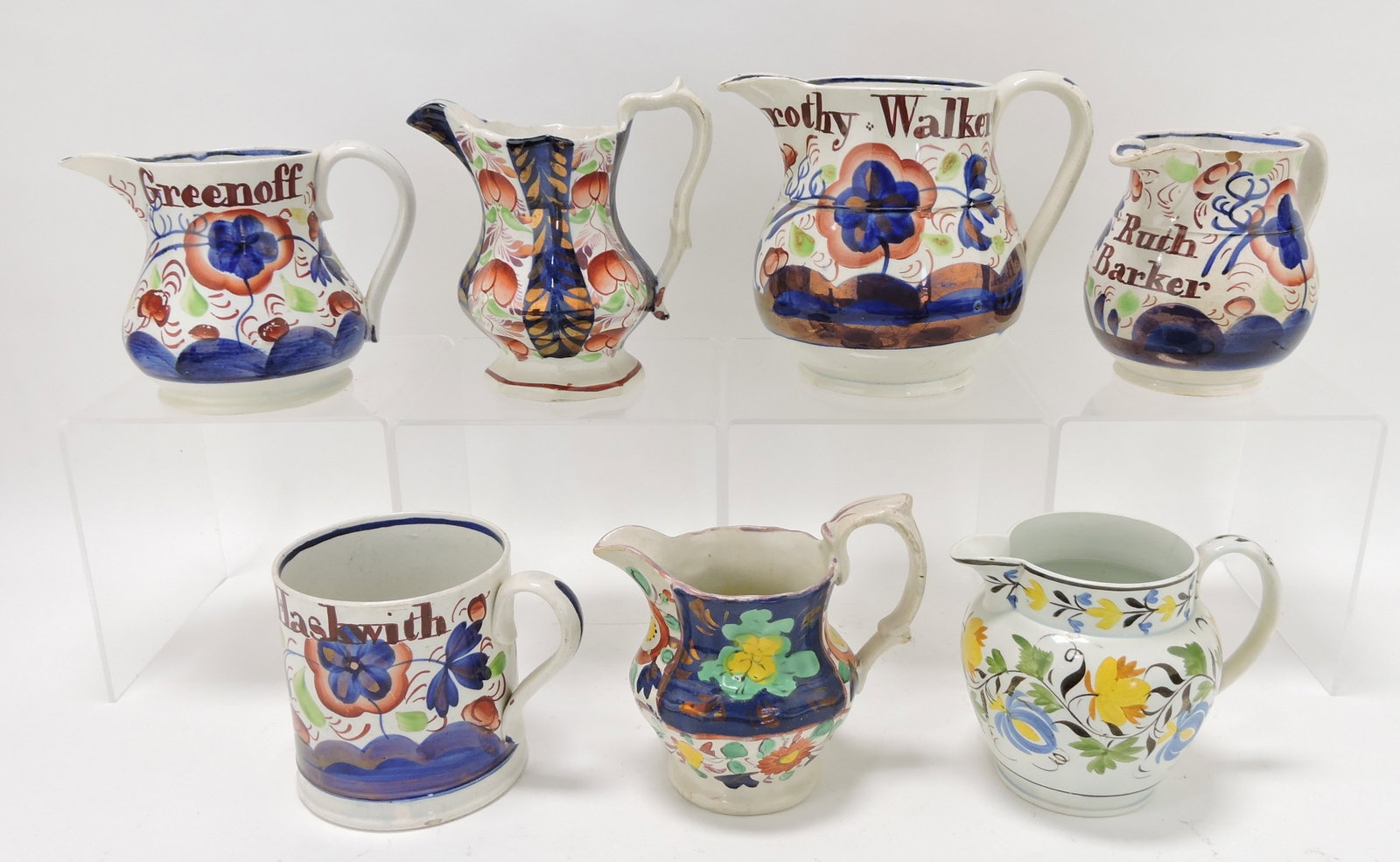 Staffordshire lot of 6 pitchers and one: mug, various condition