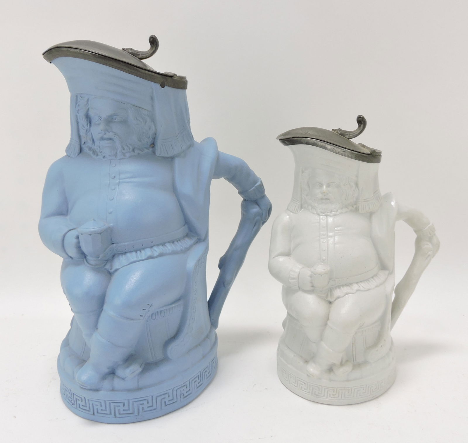 Thomas Furnival & Co relief molded: 'Old King Cole' lot of 2 pitchers with pewter top, 10 1/2" & 8"