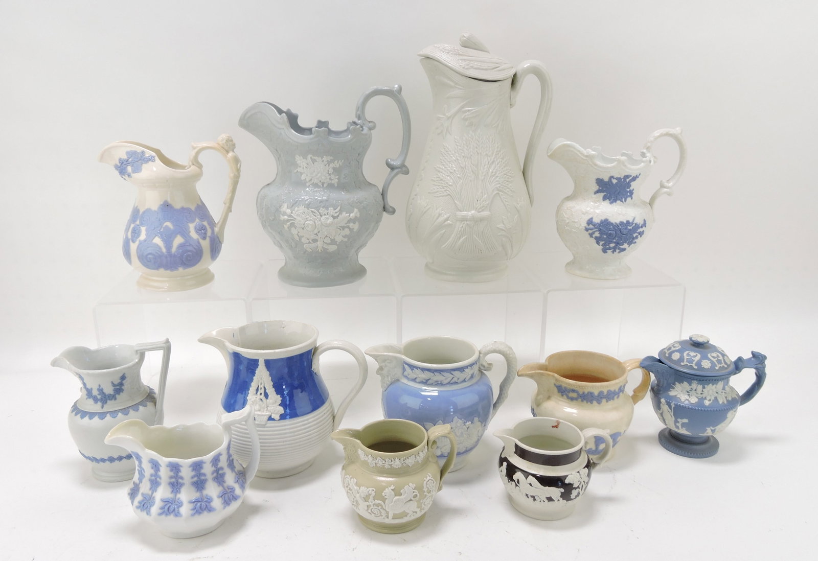 Lot of 12 English molded jugs and: creamers, 2 1/2 to 10"
