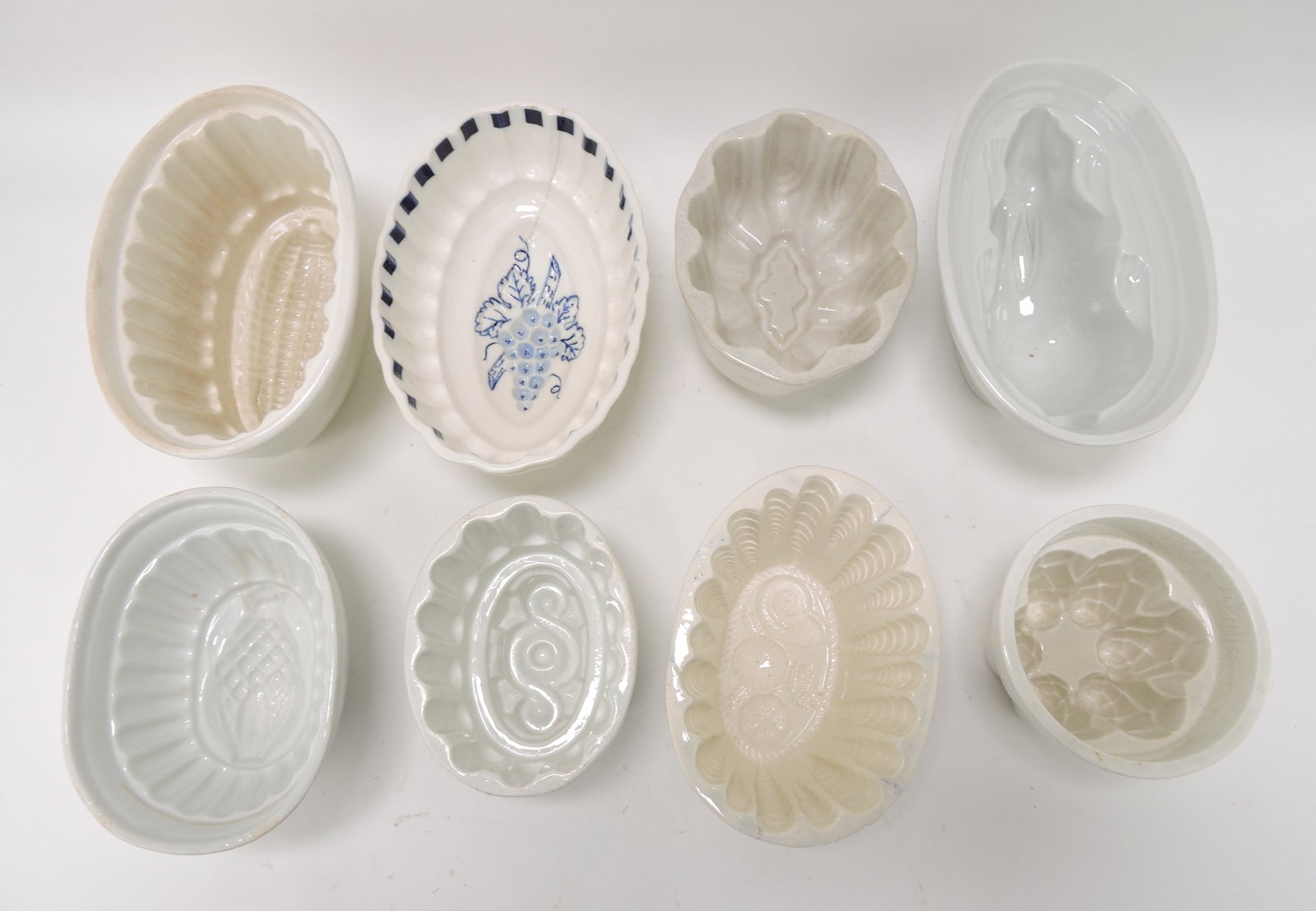 Lot of 8 food molds, various condition: .