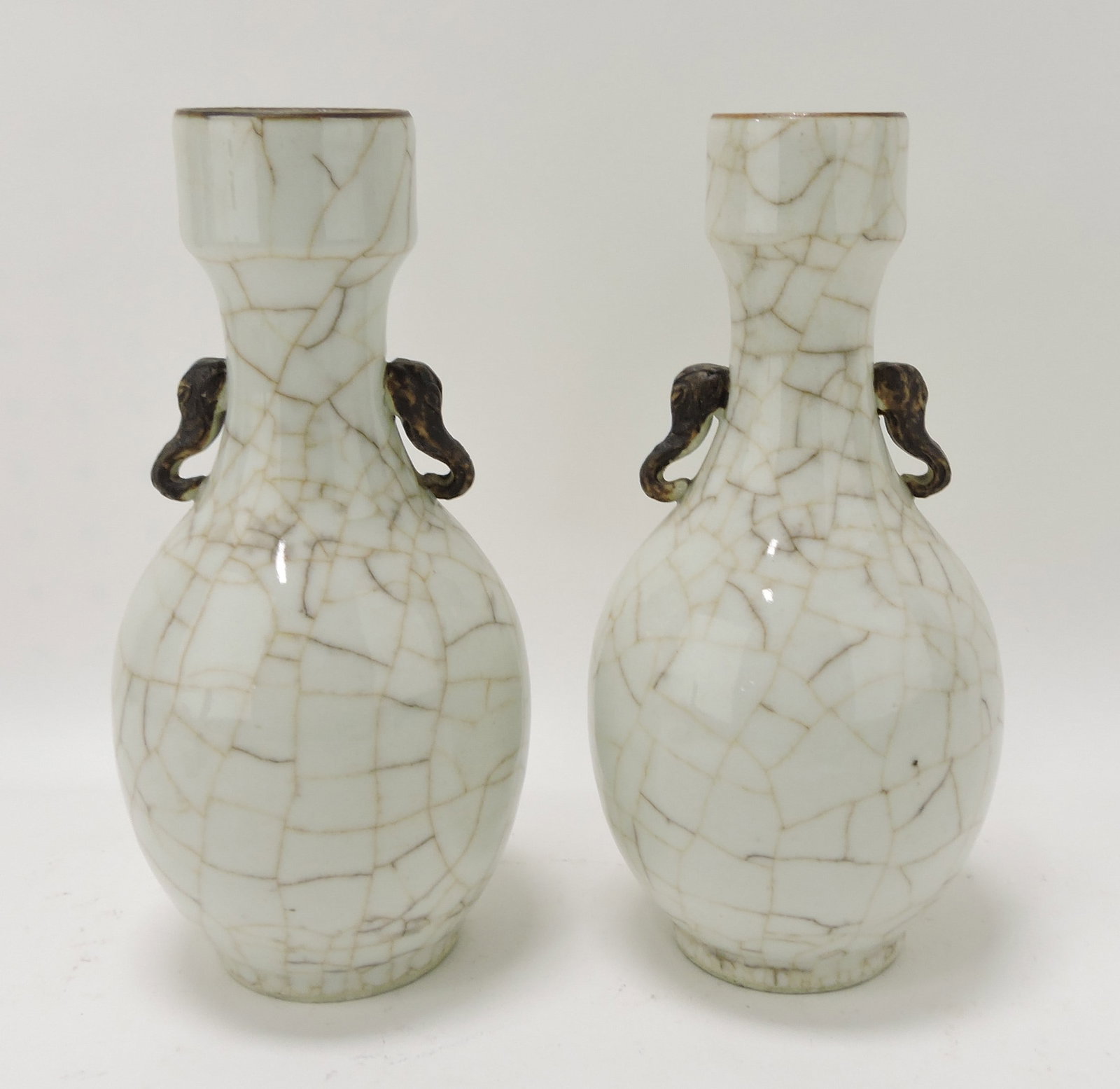 Oriental pair of 9 1/2" vases: .