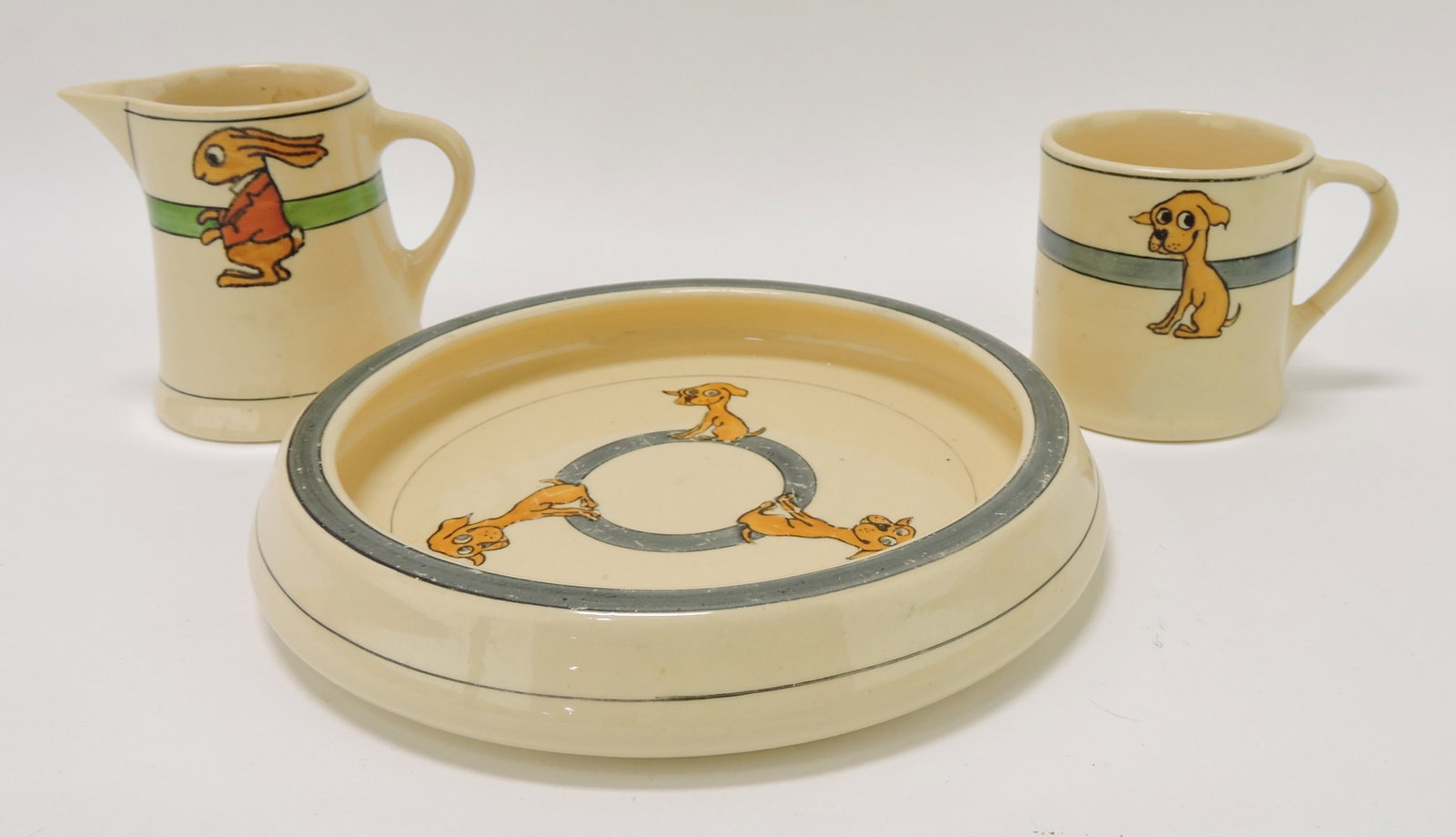 Roseville child's bowl, cup & creamer: .