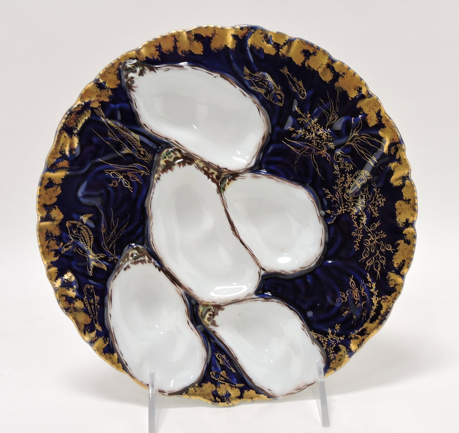 Porcelain five well 'turkey' style oyster: plate with cobalt ground and heavy gold, 8 1/2"