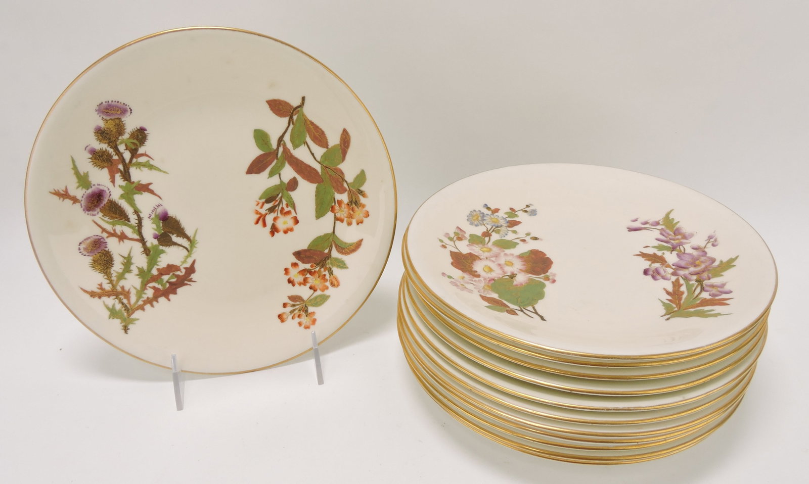 Royal Worcester set of 12 - 9 1/4": floral plates c1889, each with different flower