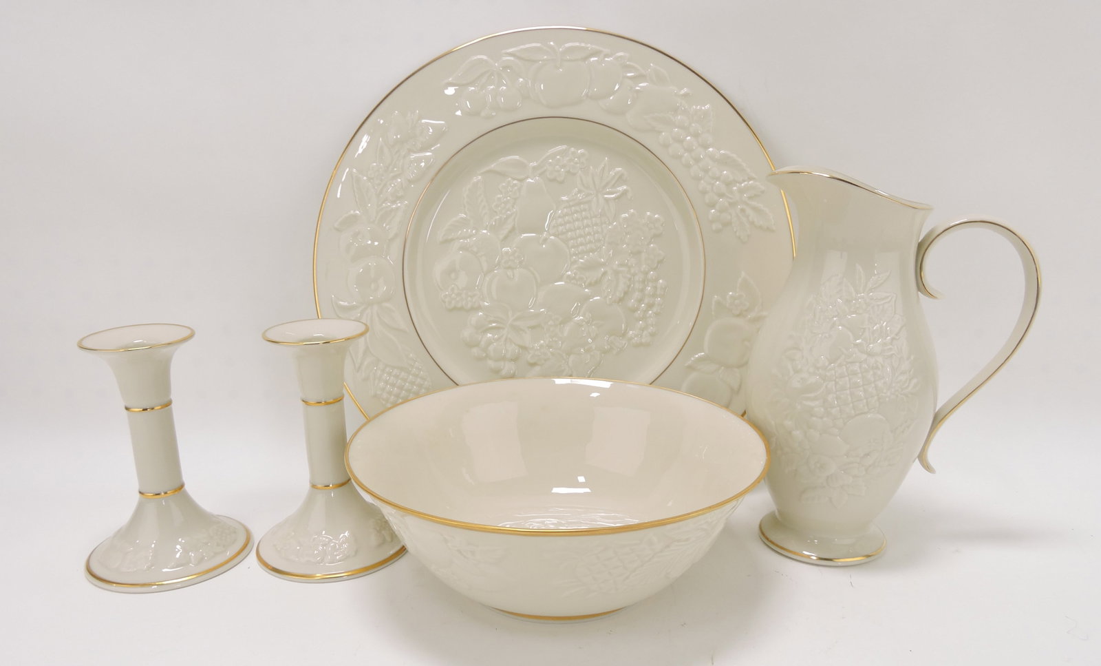 Lenox ivory porcelain 'Fruits of Life': 13" charger, 9" bowl, pair 5 1/2" candles, and 9" pitcher 24kt gold trim