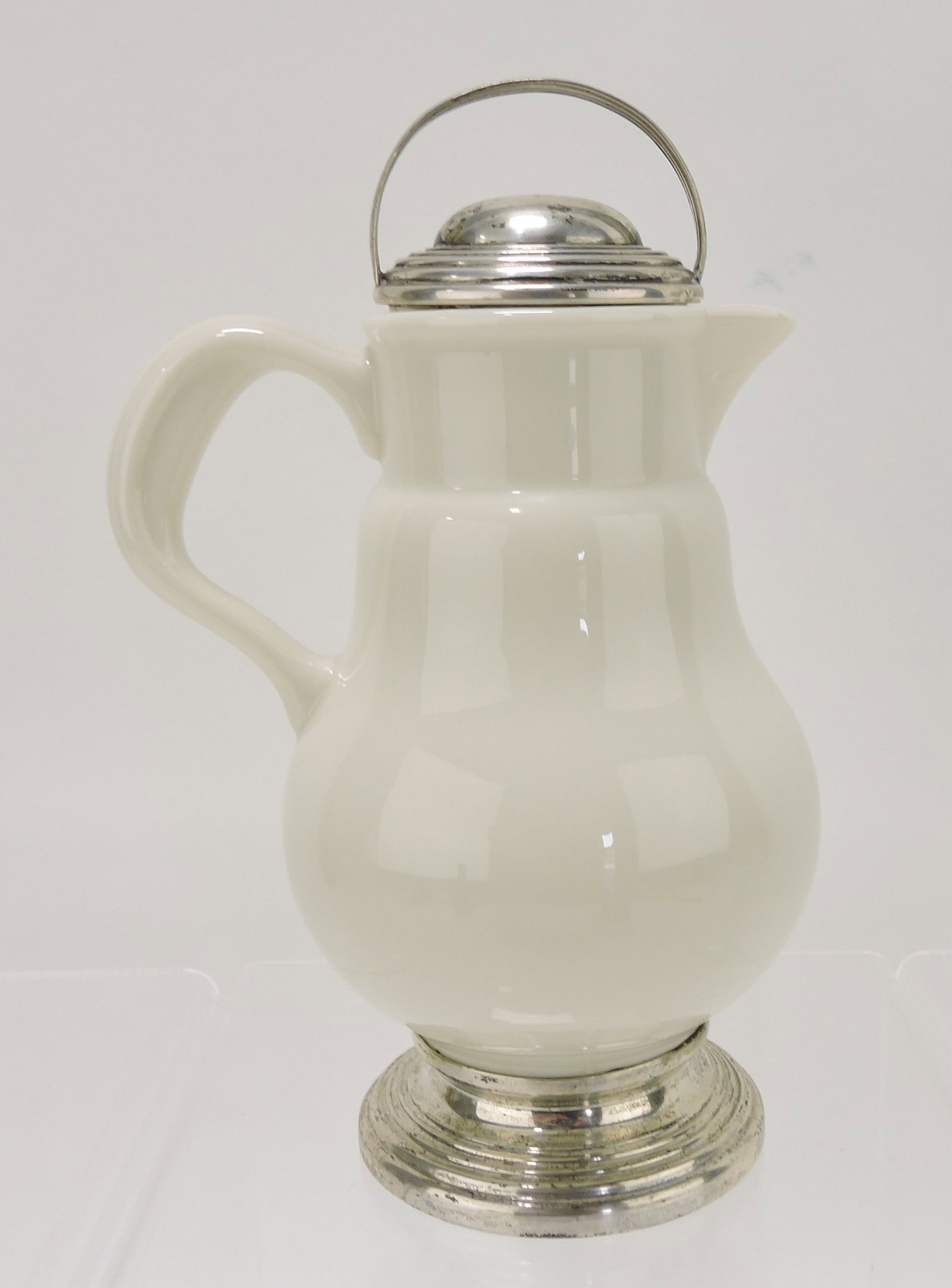 Lenox porcelain ivory syrup with sterling: silver base and cover, 7"