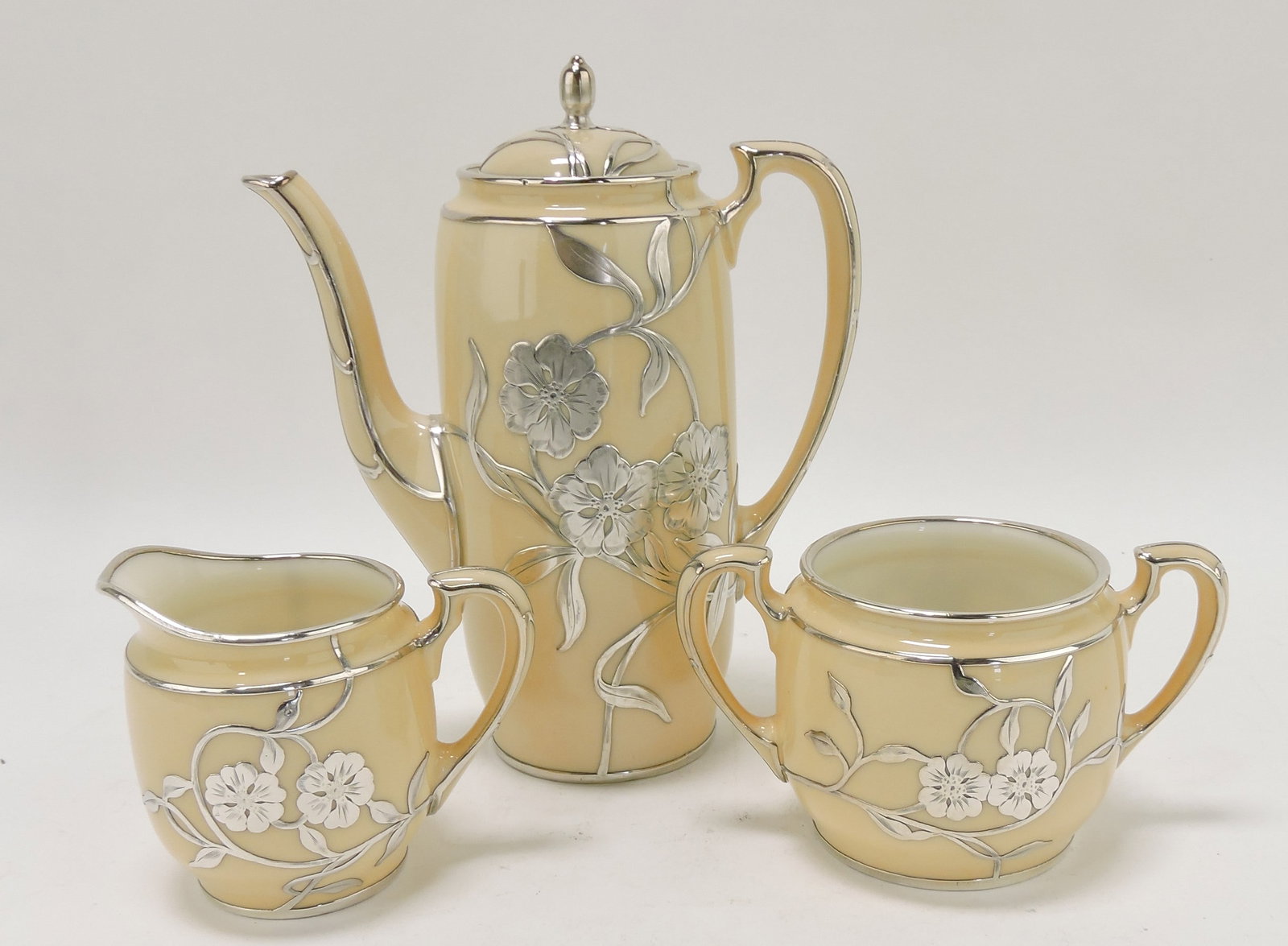 Lenox ivory porcelain 3 pc: tea set with silver overlay