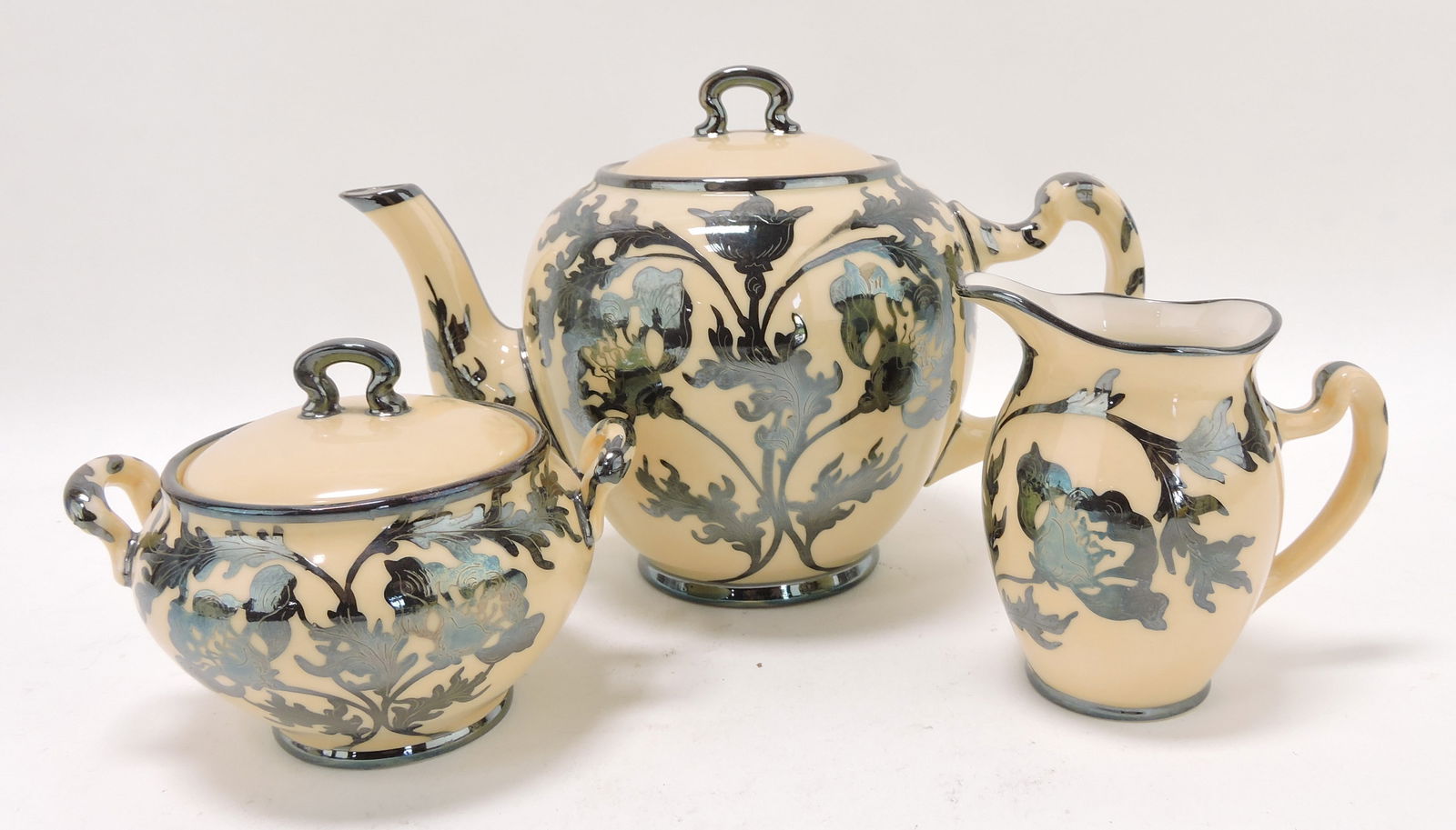 Lenox ivory porcelain 3 pc: tea set with silver overlay