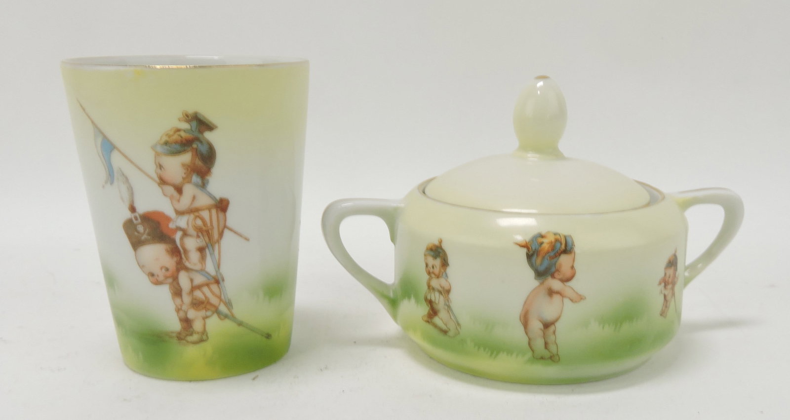 Royal Rudolstadt Rose O'Neill Kewpie: tumbler and covered sugar