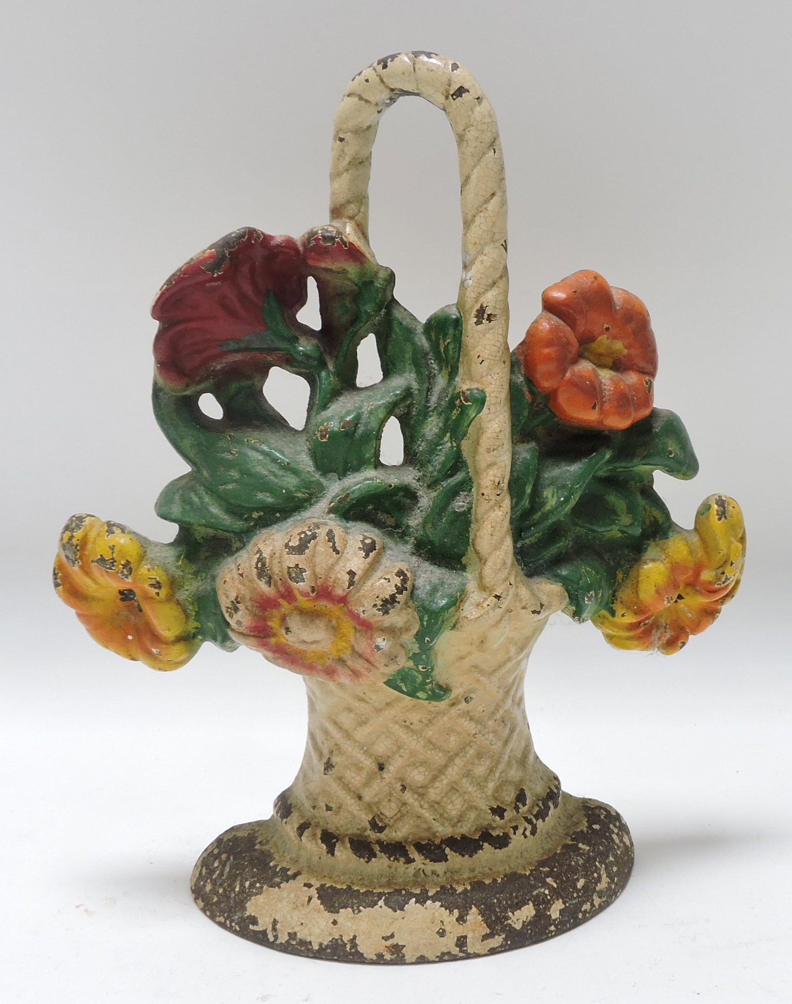 Cast iron flower basket doorstop, 9 1/2": .