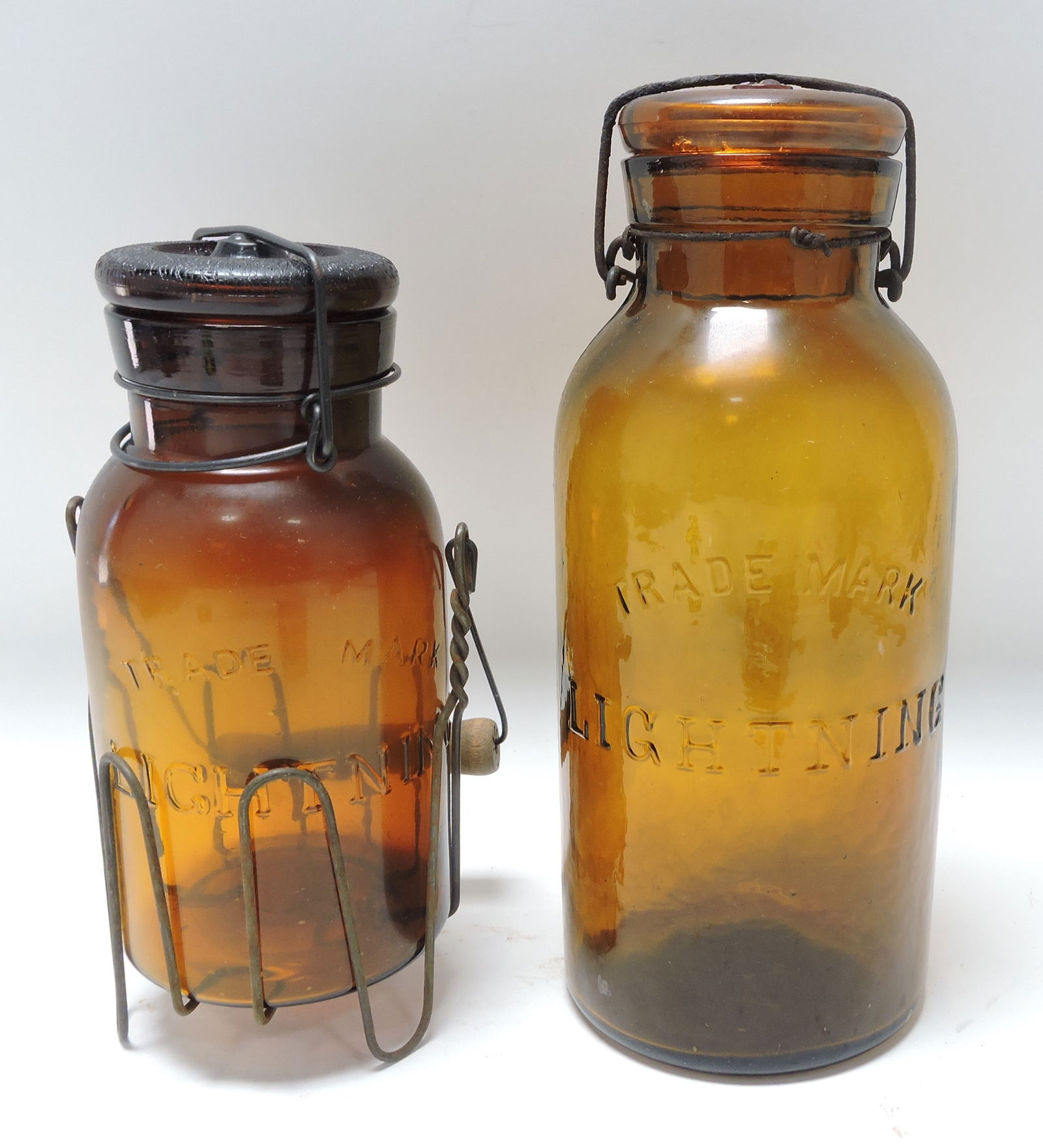 Lot of 2 amber 'Lightning' fruit jars, (1 of 1)