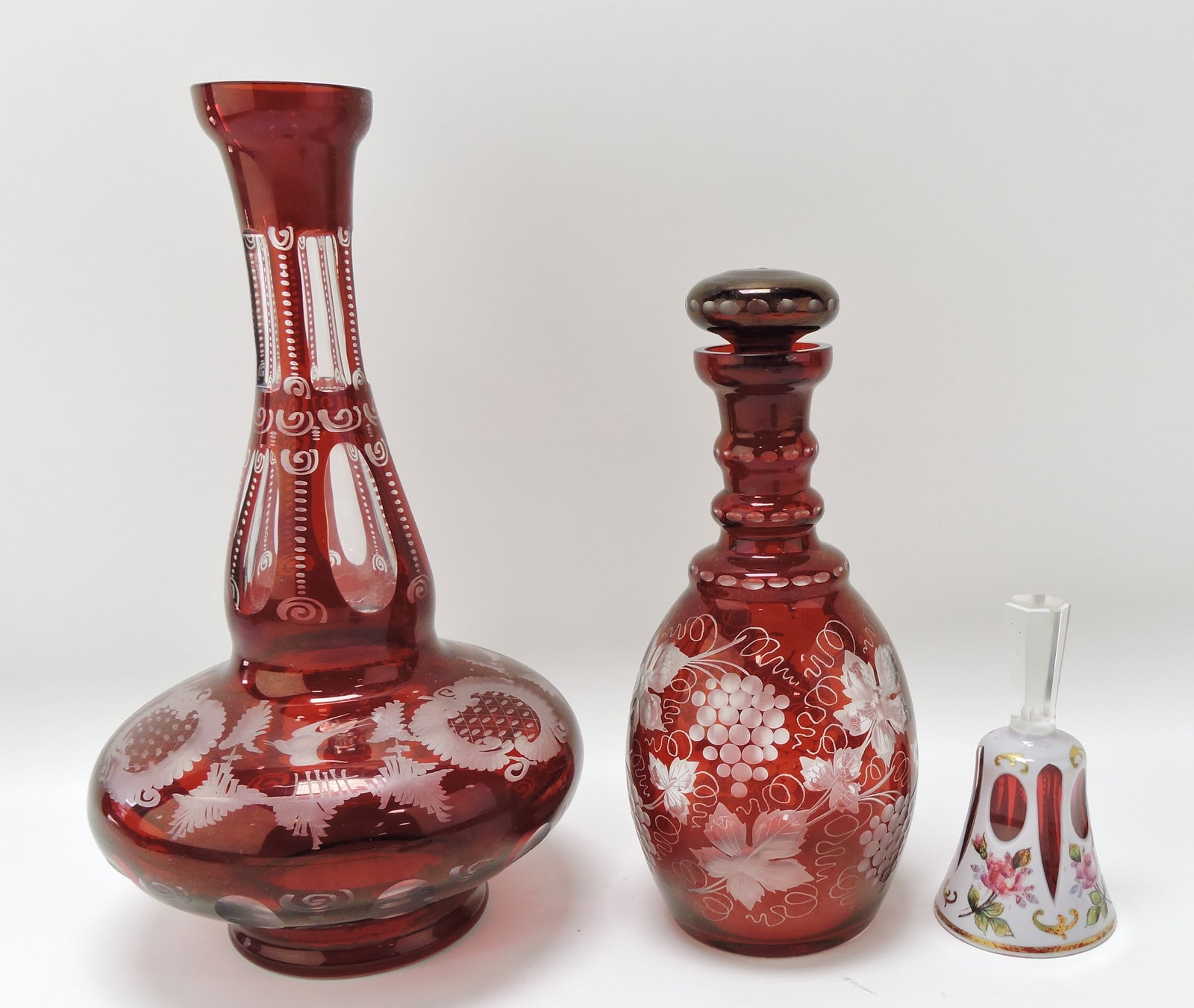 Bohemian lot of 2 decanters and a bell: .