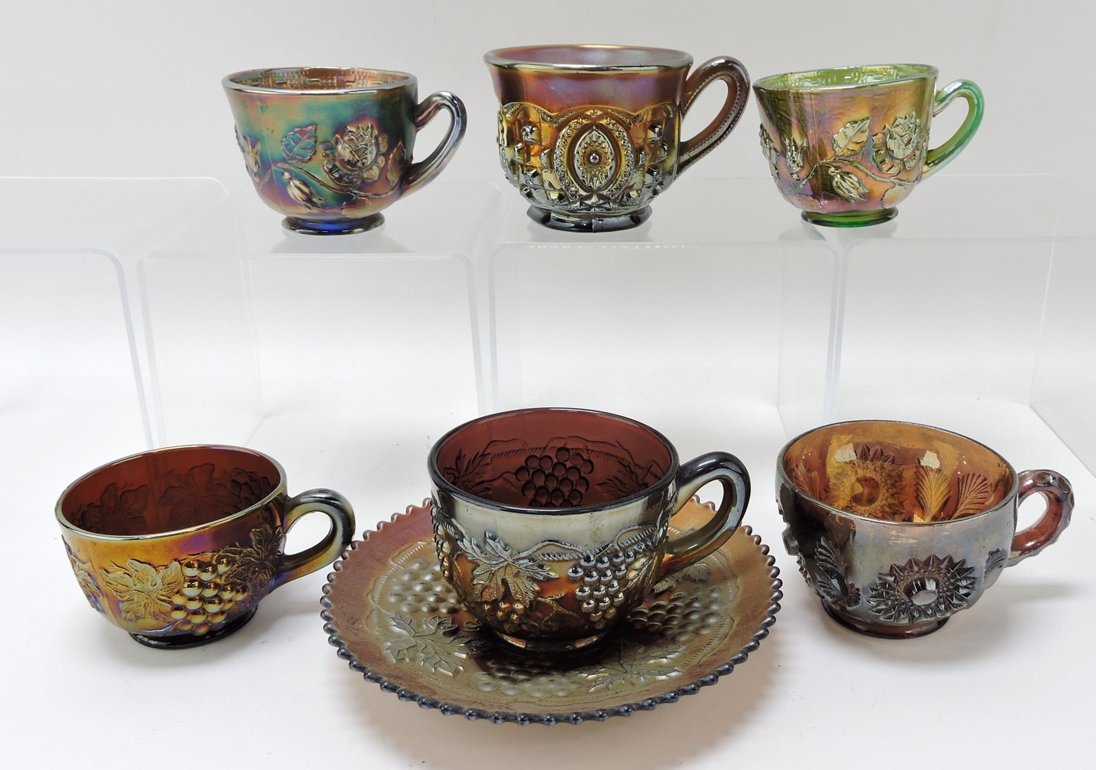 Carnival glass lot of 6 cups and: 1 saucer