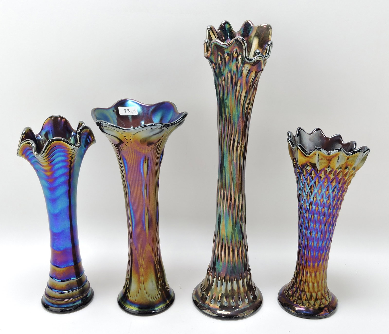 Amethyst carnival glass lot of 4 vases,: 9 1/2 to 15 1/2"