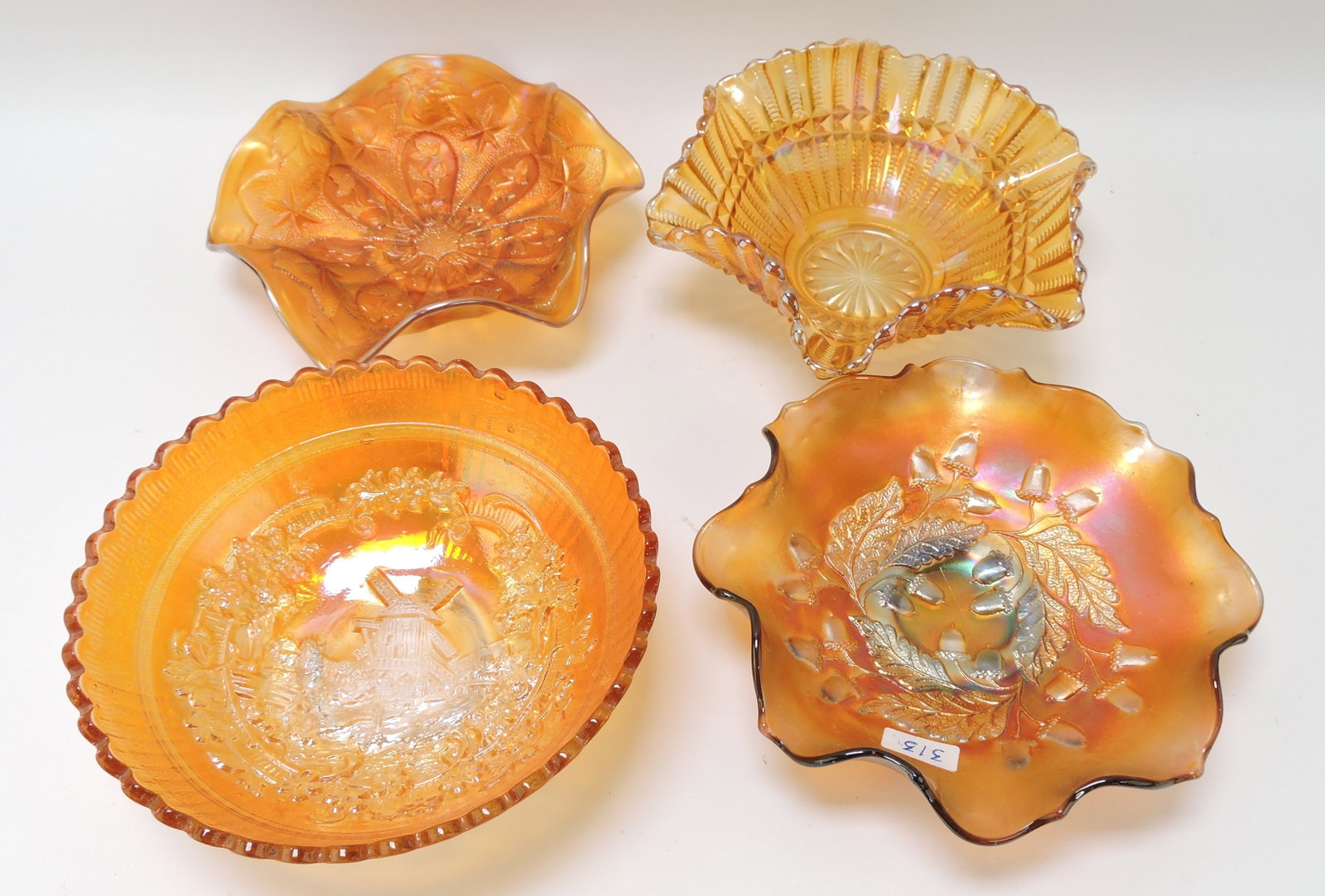 Marigold carnival glass lot of 4 bowls: .