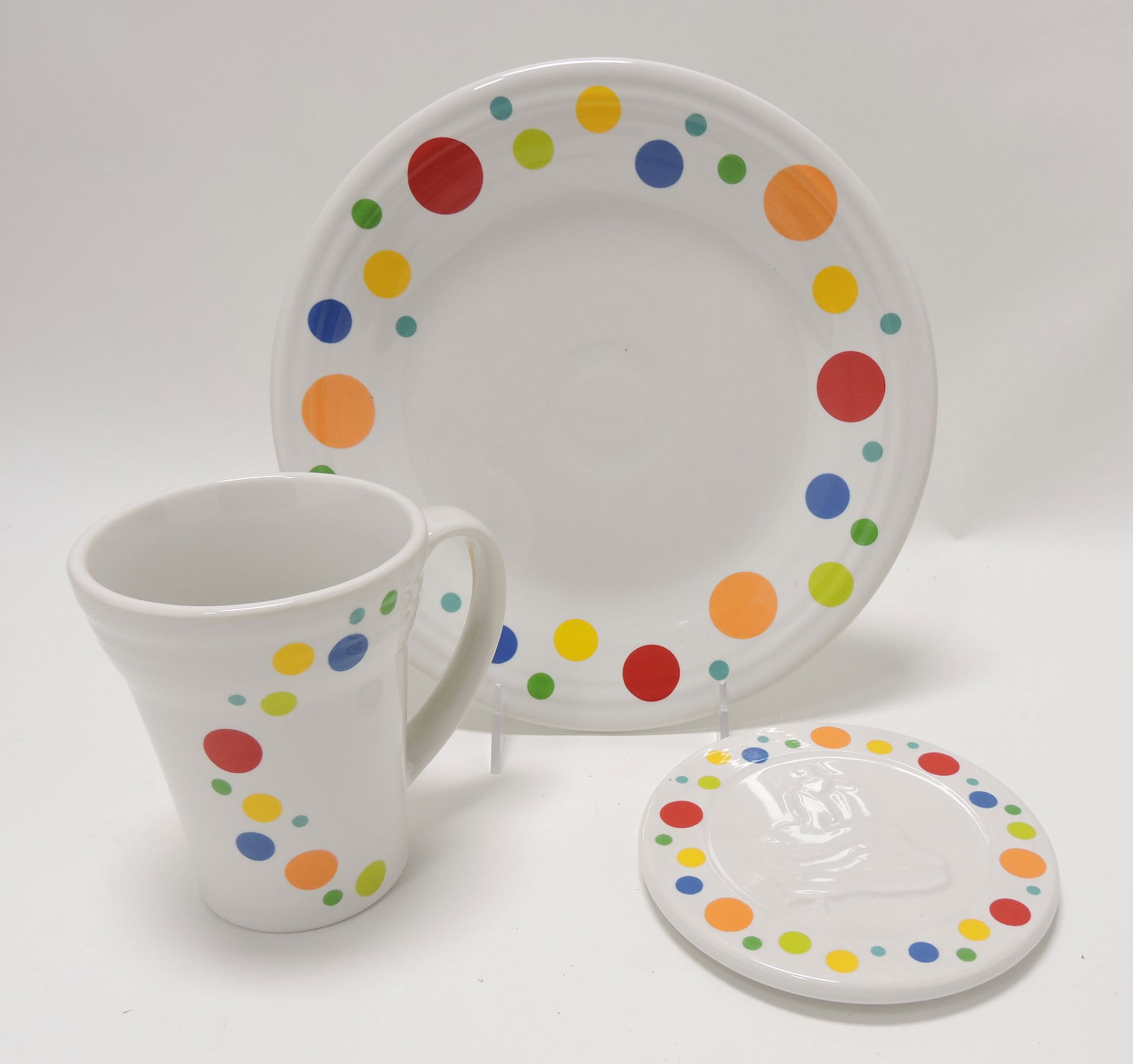 Fiesta Post 86 'Dancing Dots' group:: 10 1/2" plate, trivet, and Bistro Latte mug