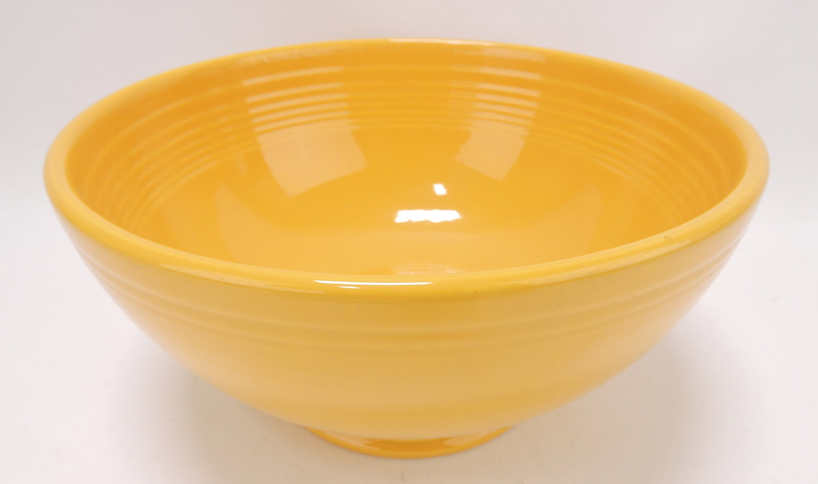 Fiesta footed salad bowl, yellow: .