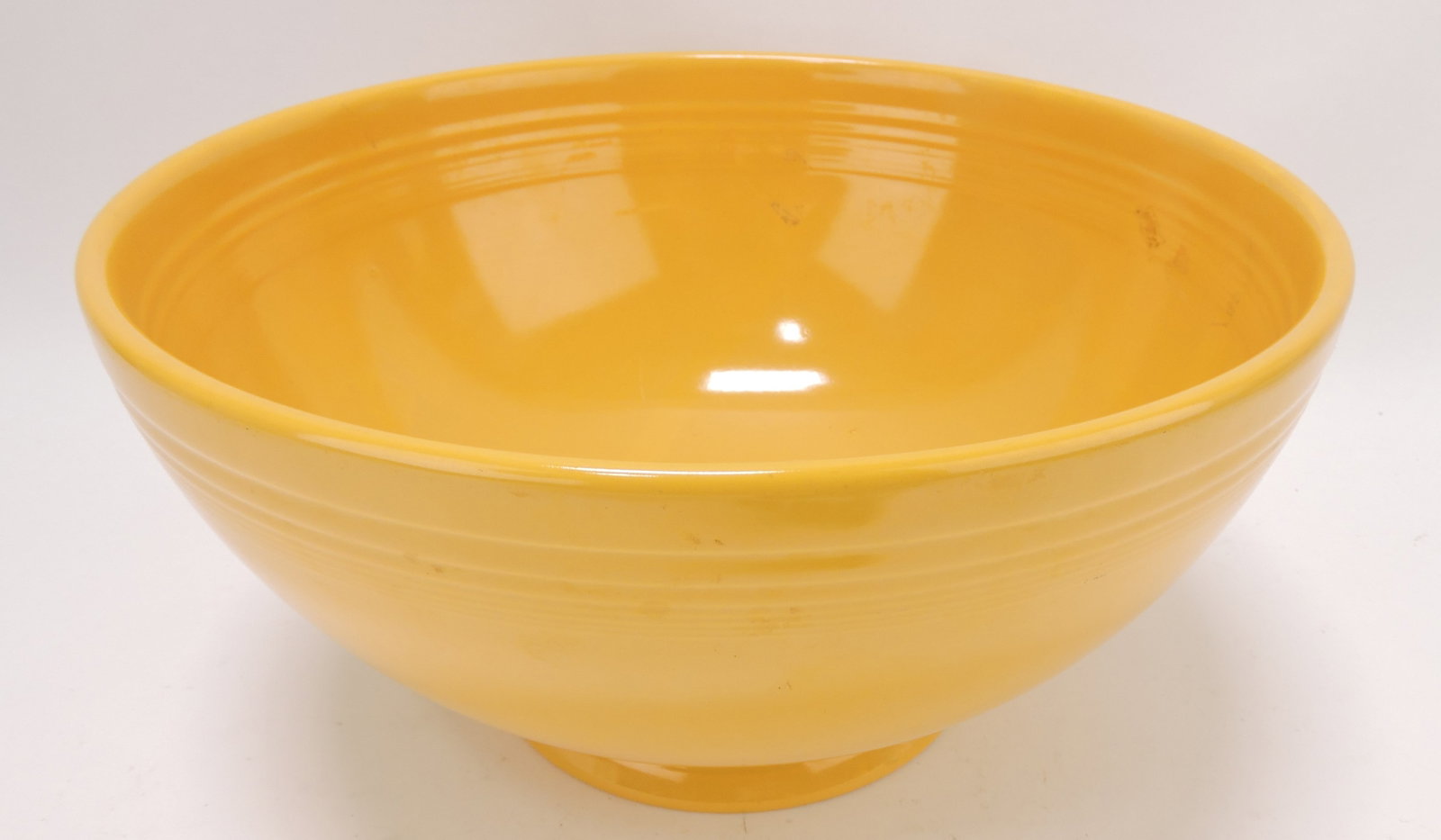 Fiesta footed salad bowl, yellow: .