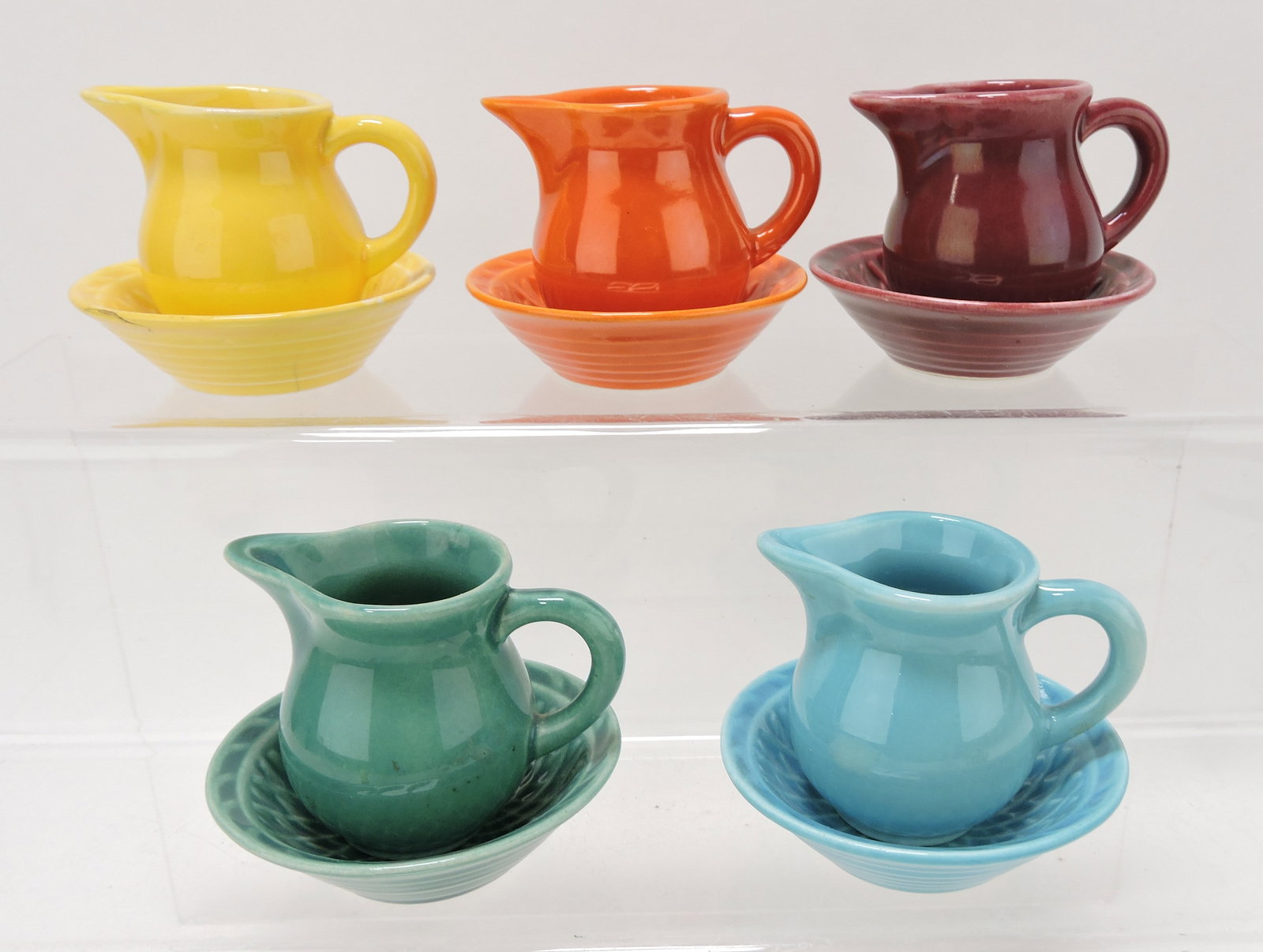 Harlequin lot of 5 individual creamers and: 5 nut dishes