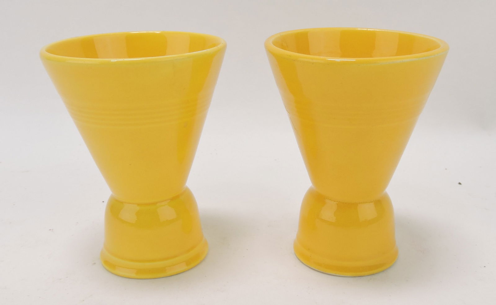 Harlequin lot of 2 double egg cups, yellow: .