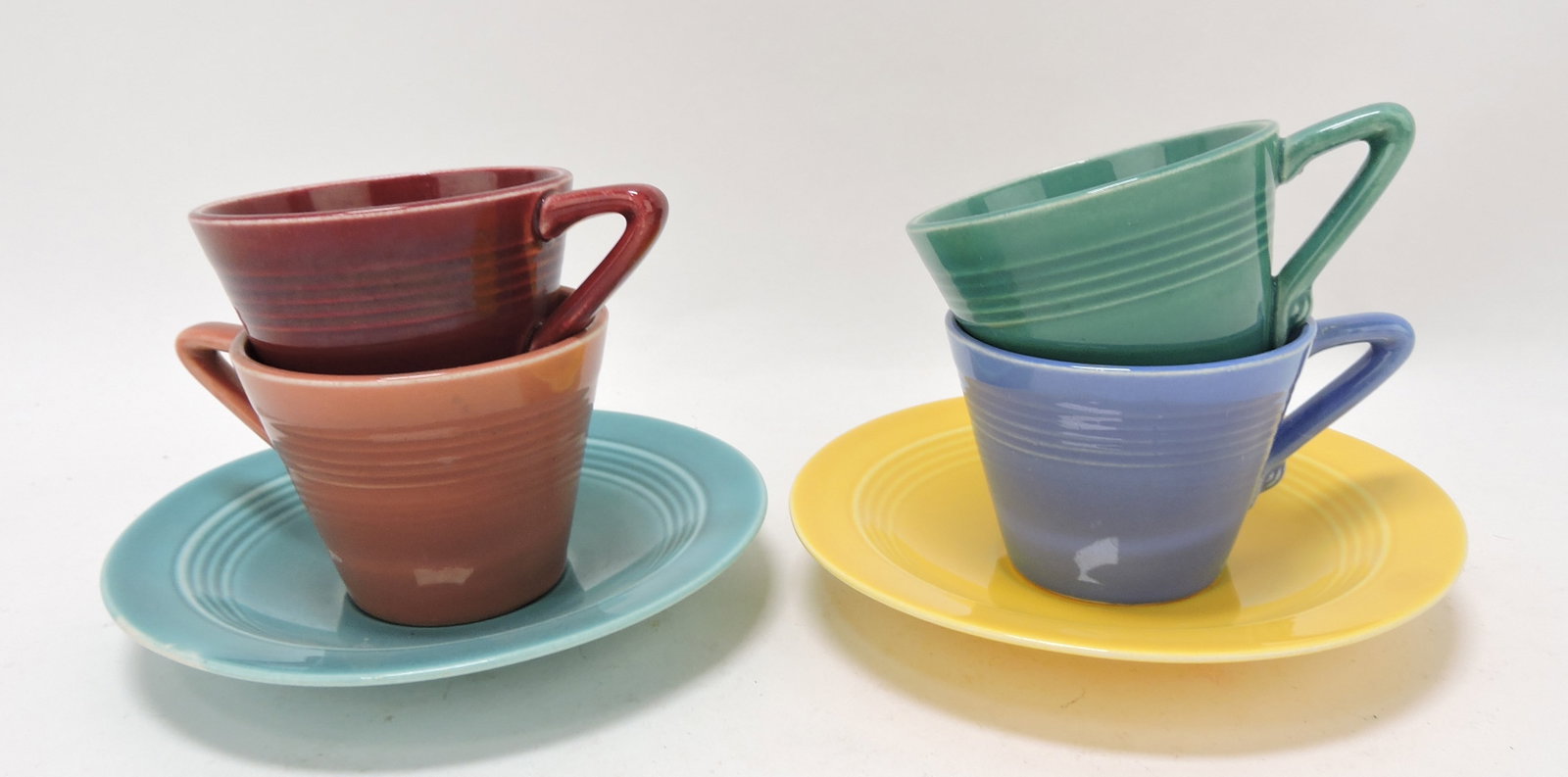Harlequin lot of 4 demitasse cups and: 2 saucers, mixed