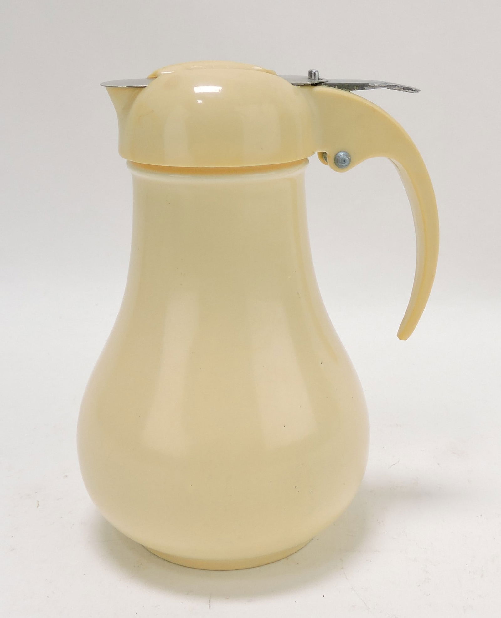 Fiesta syrup pitcher, ivory (1 of 1)