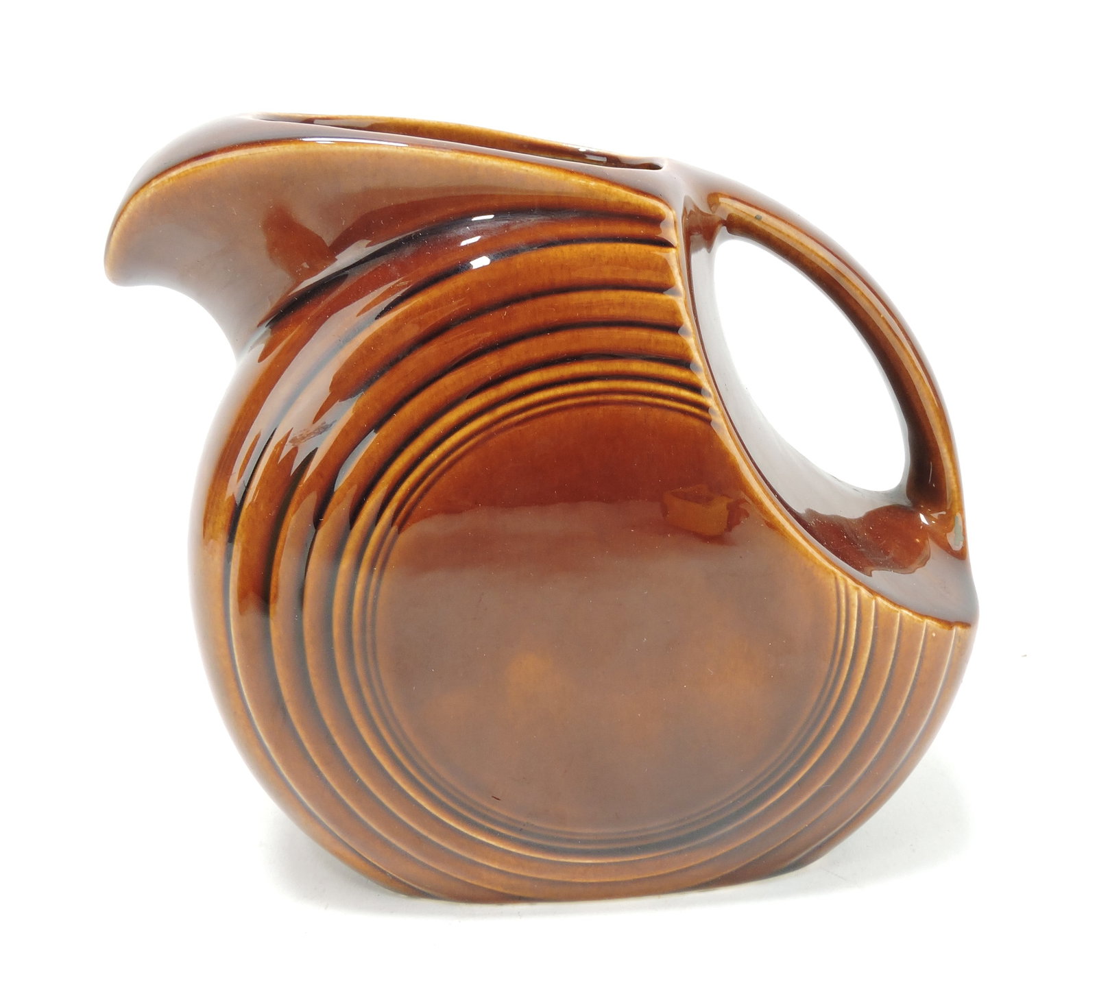 Fiesta Amberstone disc water pitcher: .