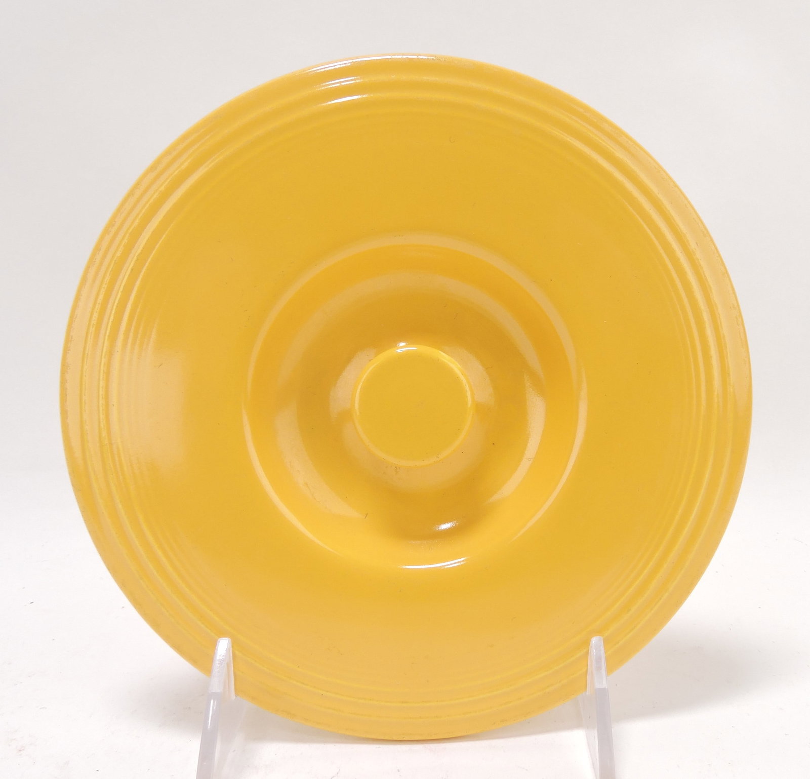 Fiesta #3 mixing bowl lid, yellow,: chip to back rim
