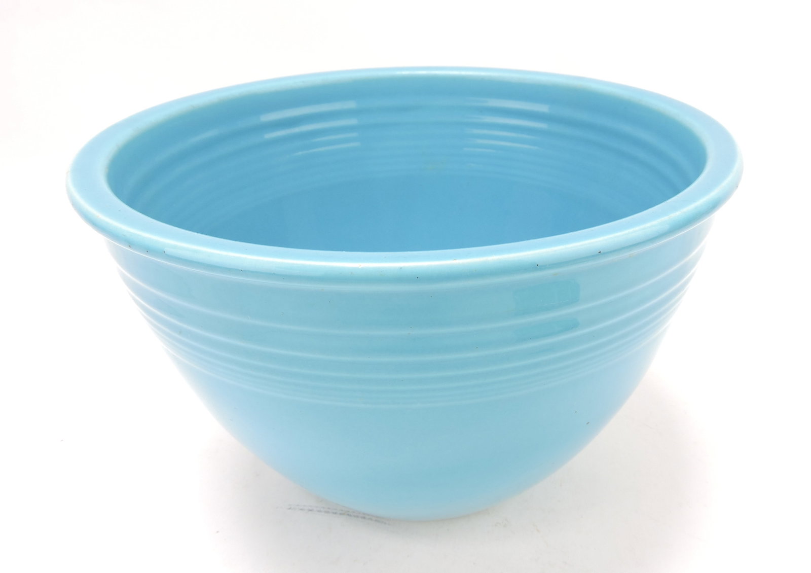 Fiesta #6 mixing bowl, turquoise, inside: rings, rim nick
