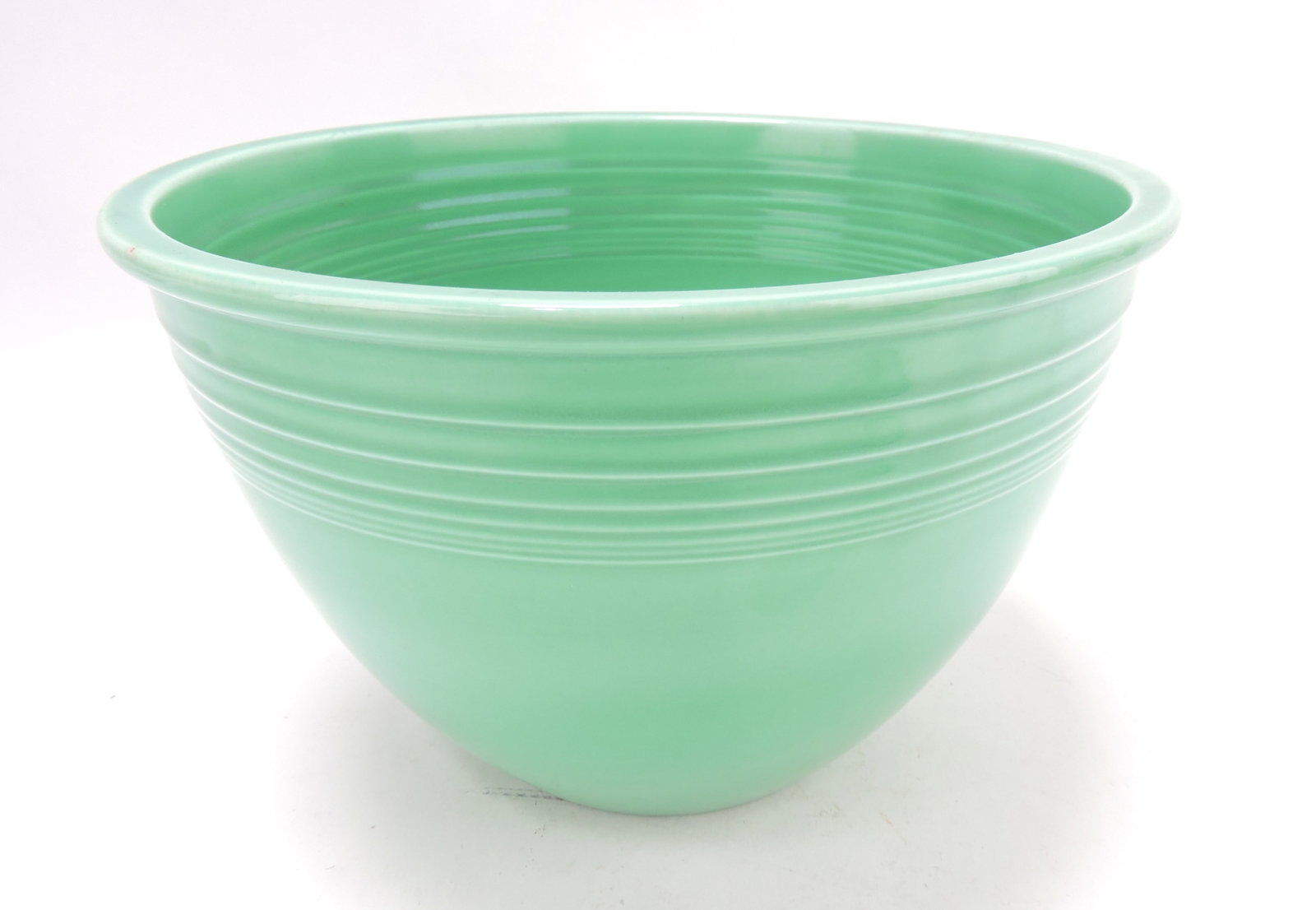 Fiesta #6 mixing bowl, green, inside: rings, minor rim nick