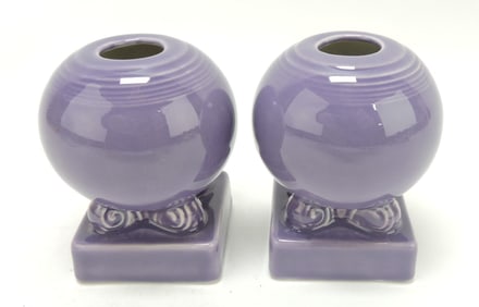 Fiesta Post 86 pair of round candlesticks,