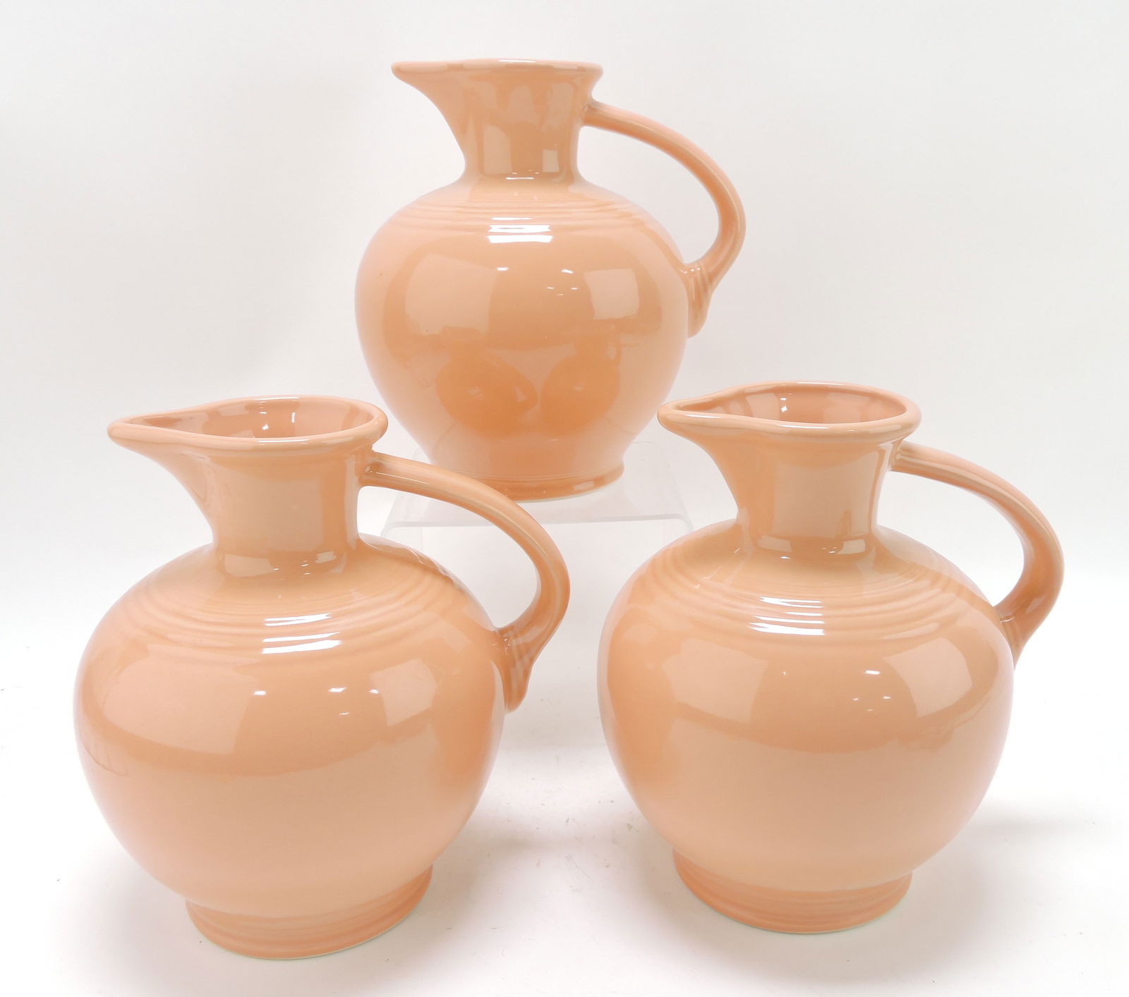 Fiesta Post 86 lot of 3 carafes, apricot,: 8"