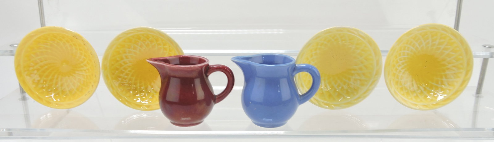 Harlequin lot of 2 individual creamers 2",: and 4 yellow nut cups 3"