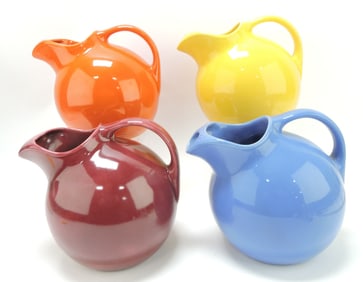 Harlequin lot of 4 service water jugs,