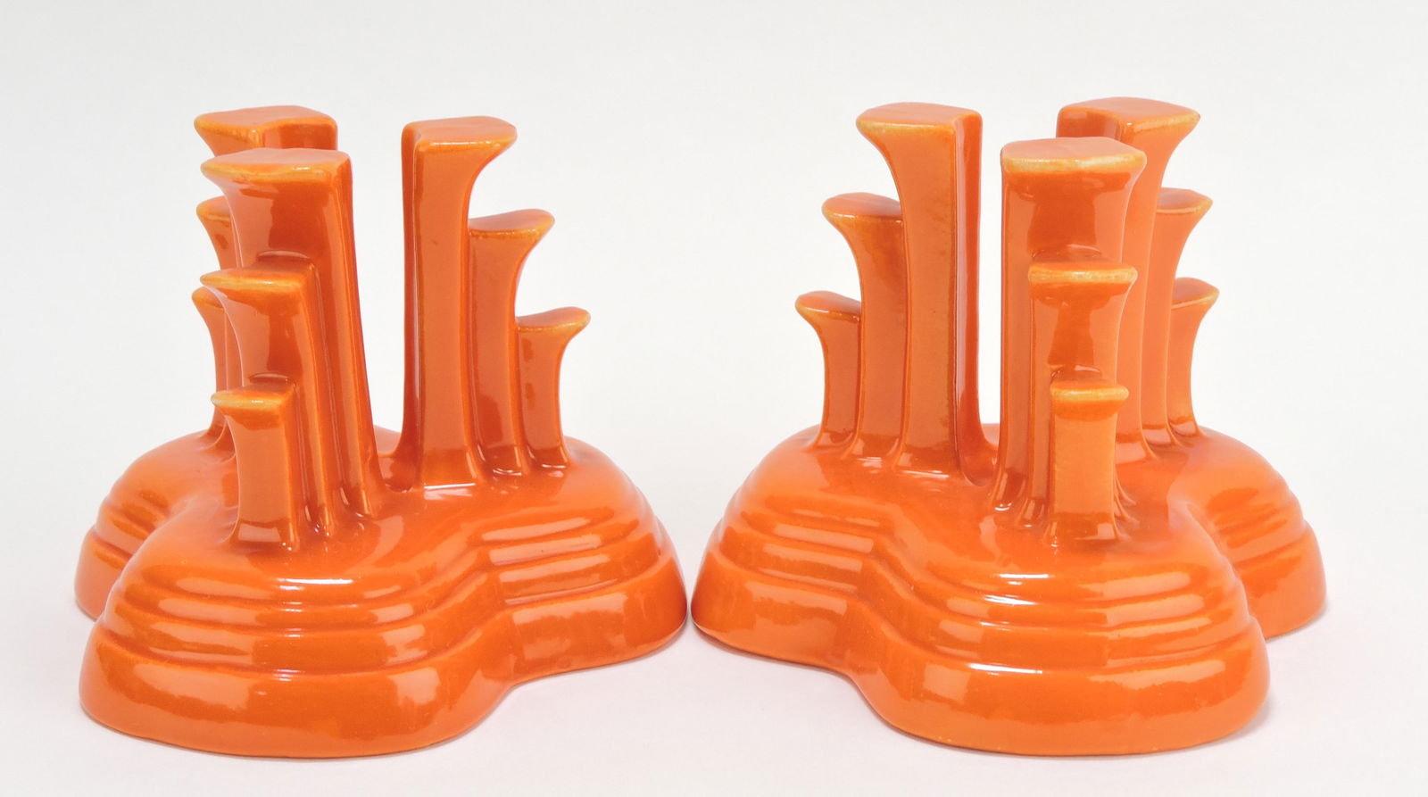 Fiesta pair of tripod candle holders,