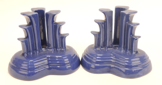 Fiesta pair of tripod candle holders,