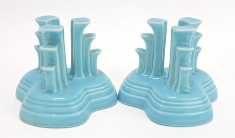 Fiesta pair of tripod candle holders,