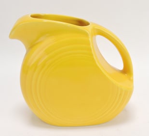 Fiesta disc juice pitcher, Harlequin yellow