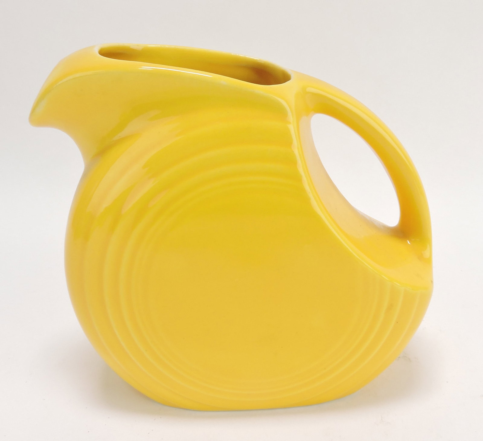 Fiesta disc juice pitcher, Harlequin yellow (1 of 1)