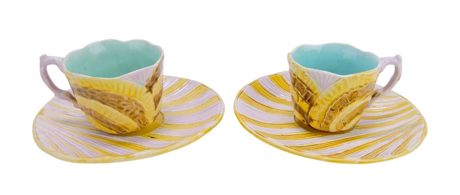 Majolica pair of shell cups & saucer: .